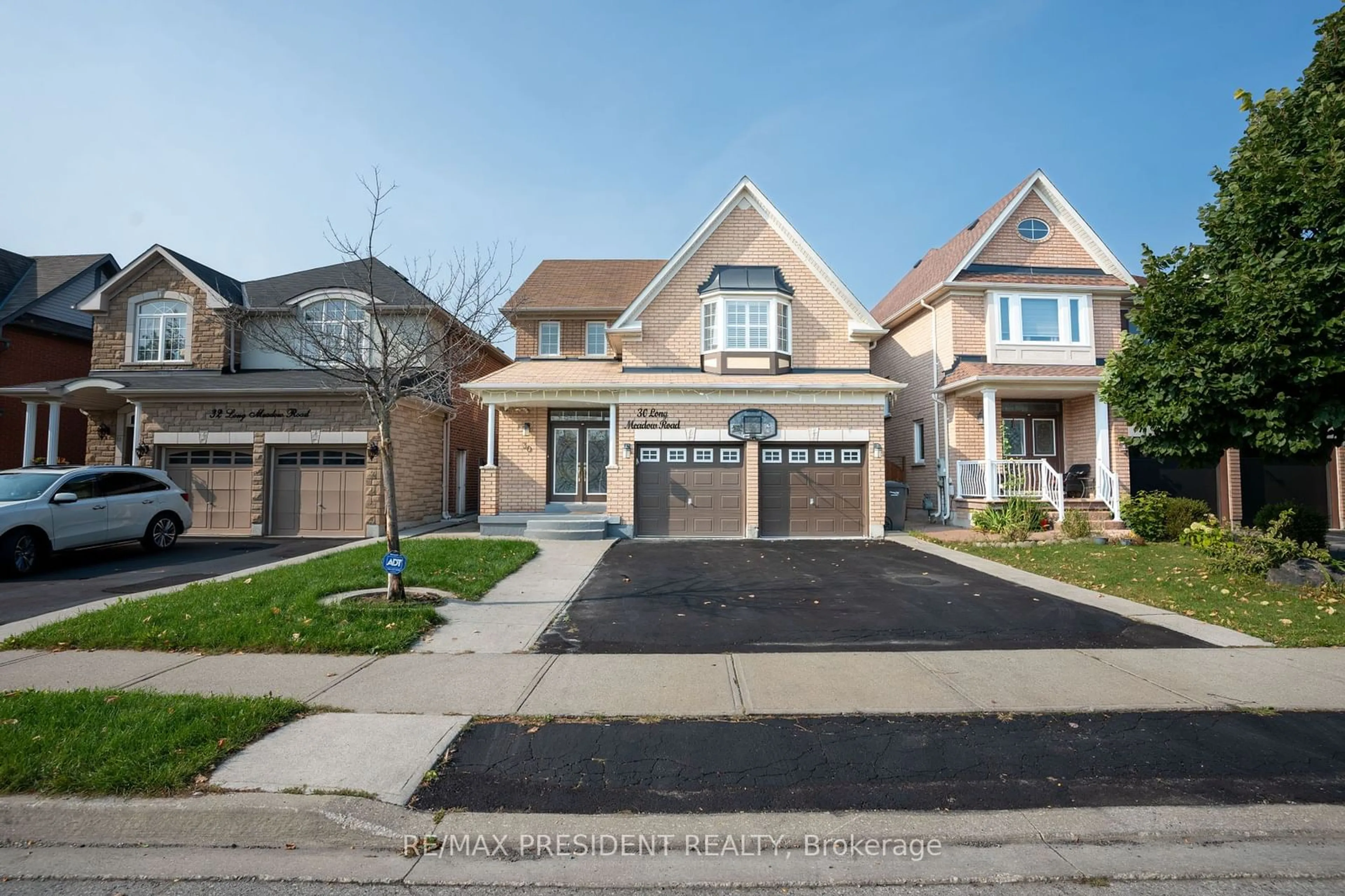 Frontside or backside of a home, the street view for 30 Long Meadow Rd, Brampton Ontario L6P 2A2