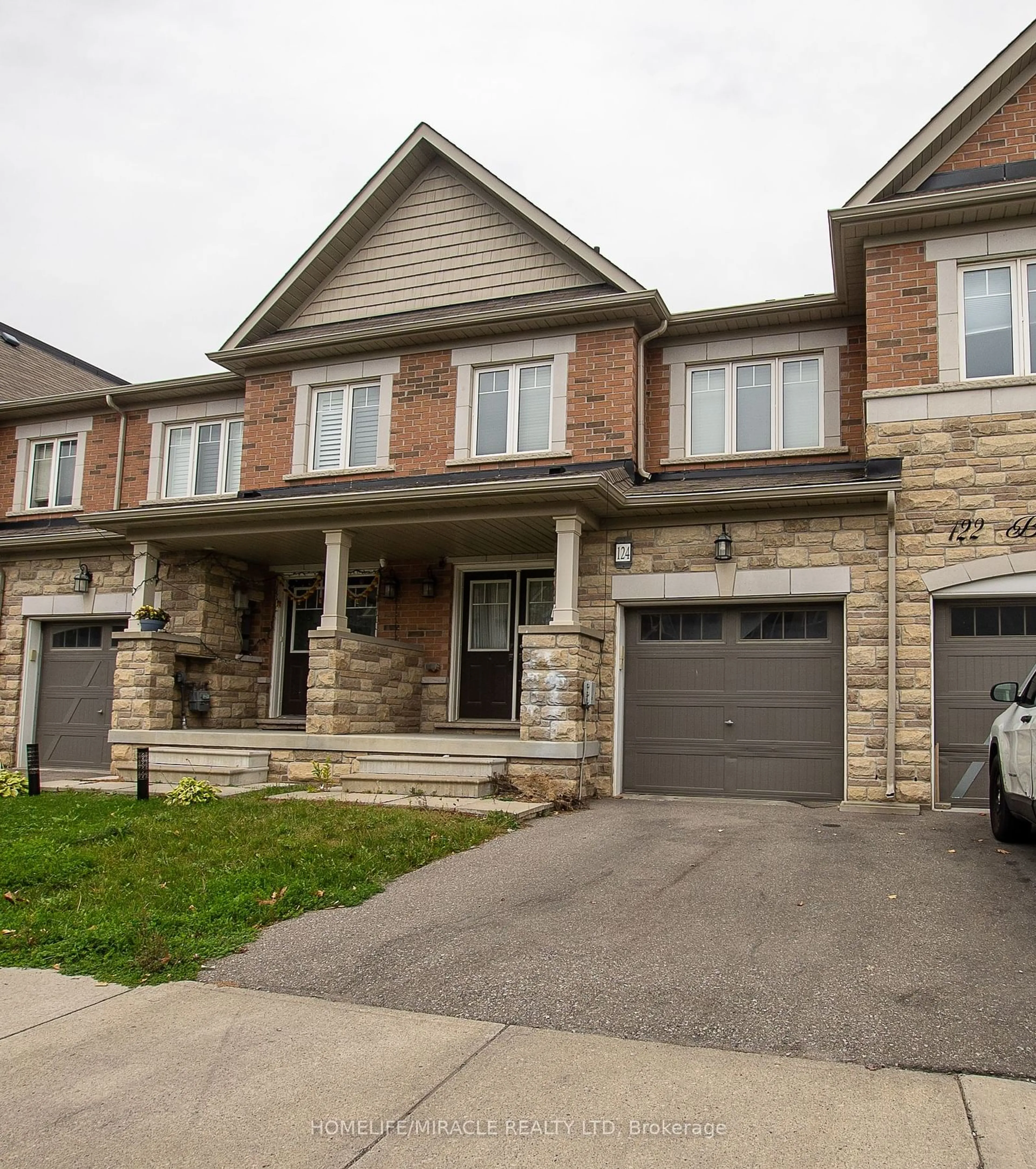 Home with brick exterior material for 124 Baffins Cres, Brampton Ontario L7A 0C7