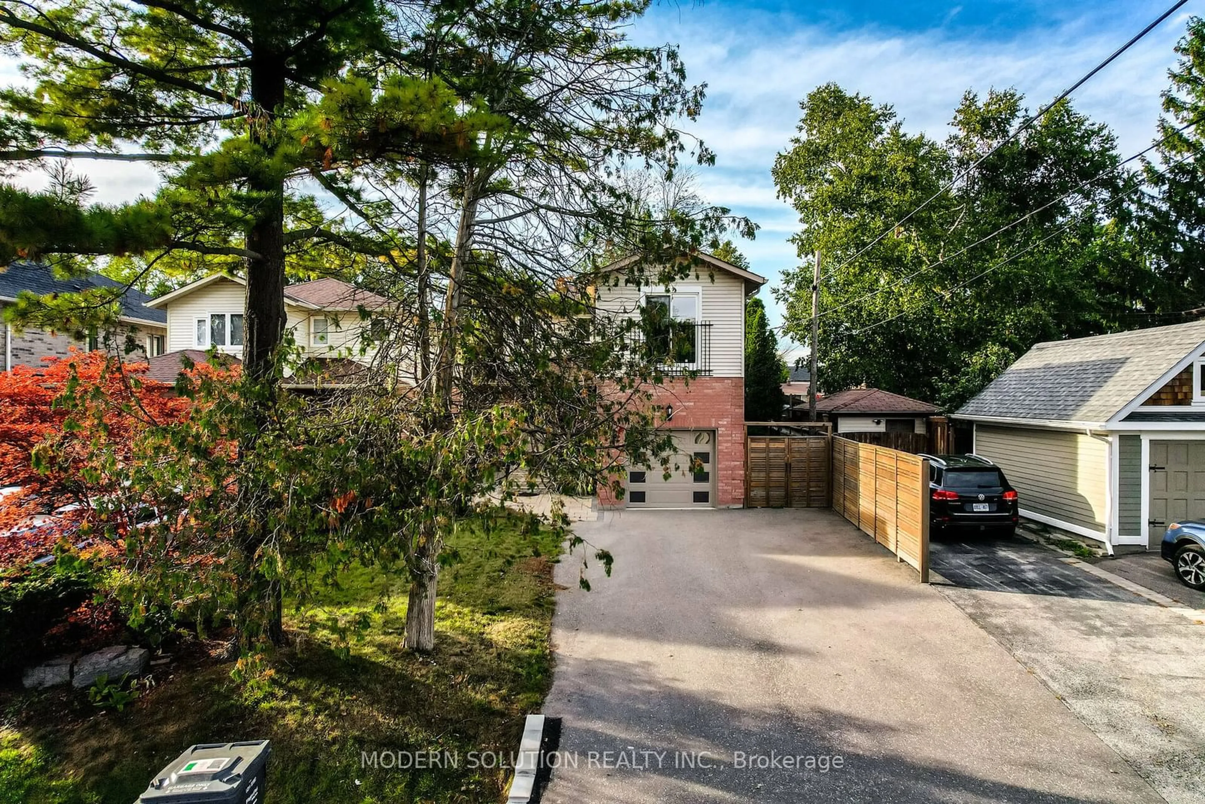 Frontside or backside of a home, the fenced backyard for 617 Curzon Ave, Mississauga Ontario L5G 1P8