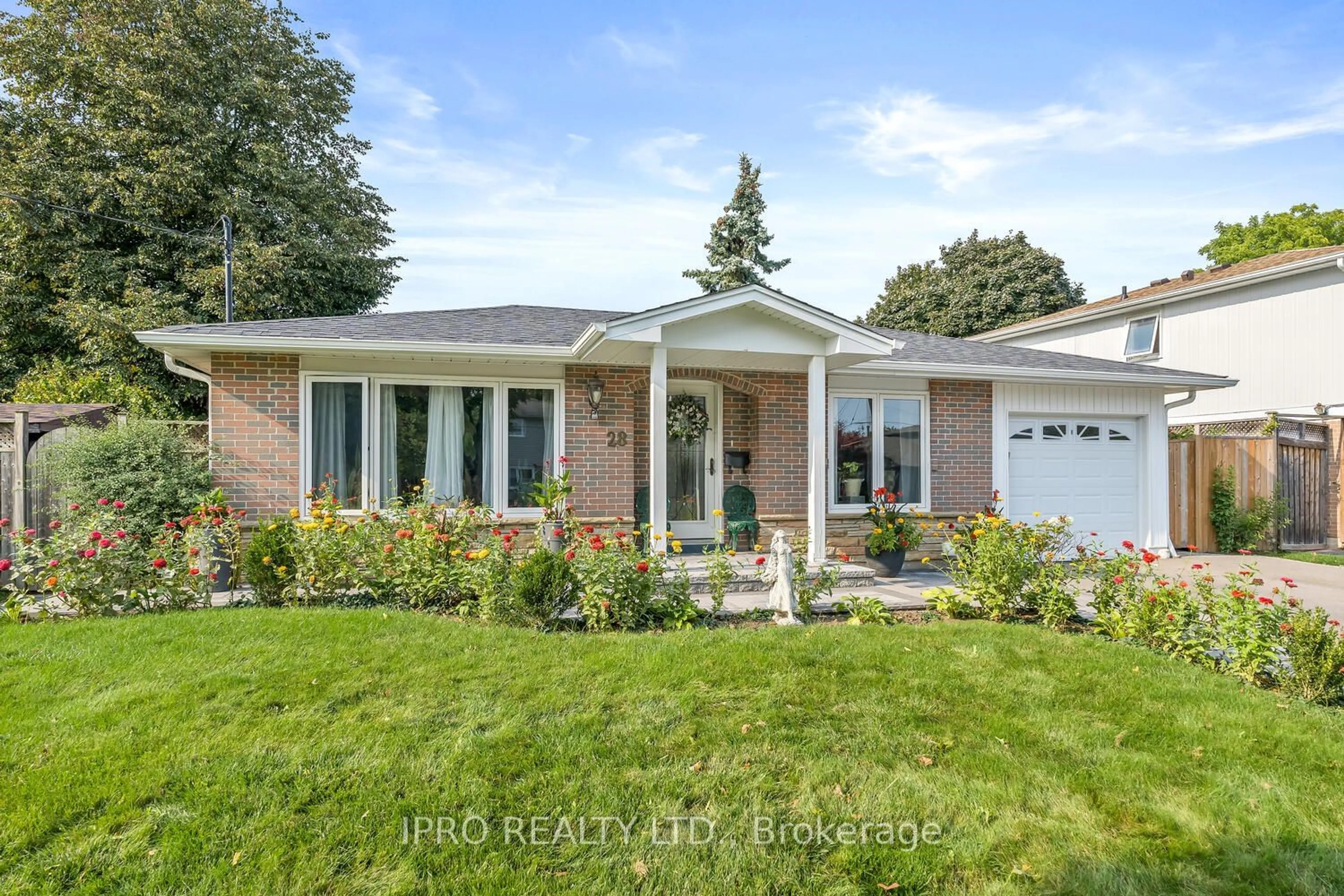 Home with brick exterior material for 28 Irwin Cres, Halton Hills Ontario L7G 1G1