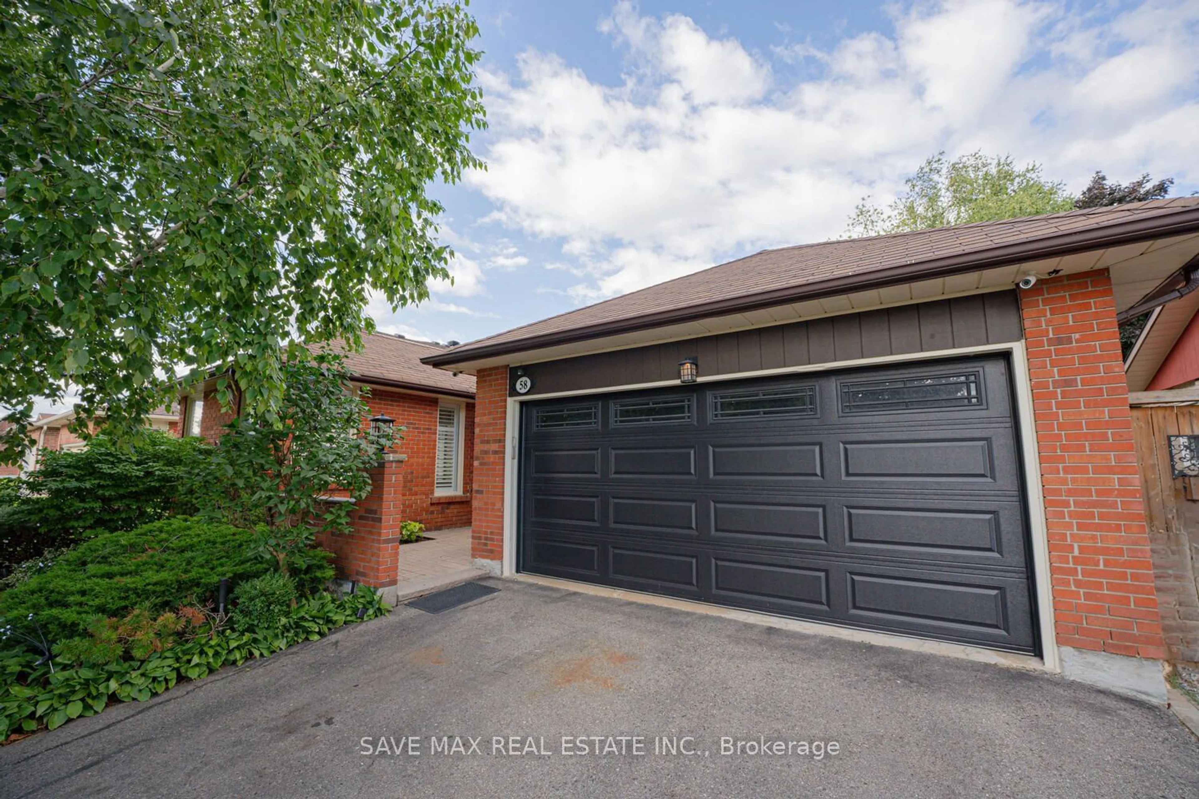 Home with brick exterior material for 58 Blackthorn Lane, Brampton Ontario L6V 3K8