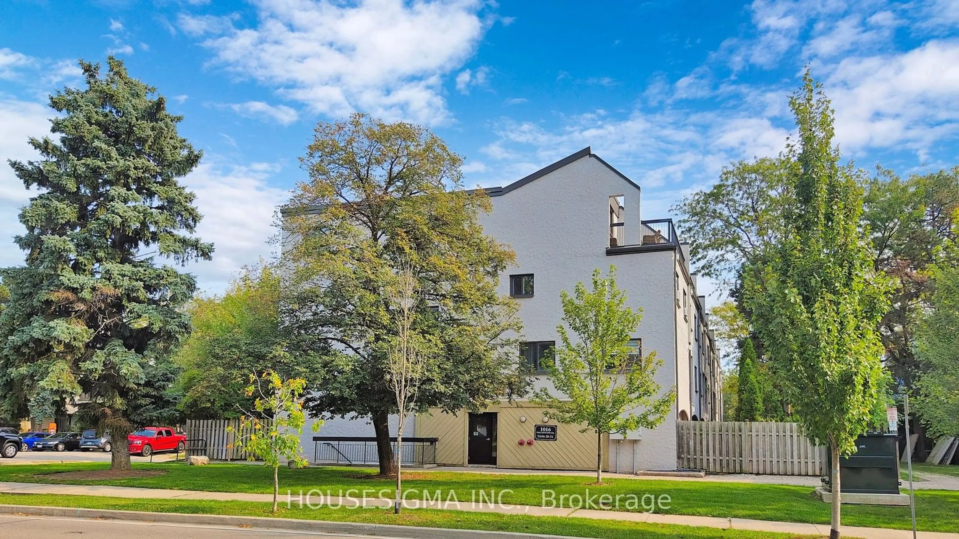 A pic from exterior of the house or condo, the fenced backyard for 1016 Falgarwood Dr #50, Oakville Ontario L6H 2P5