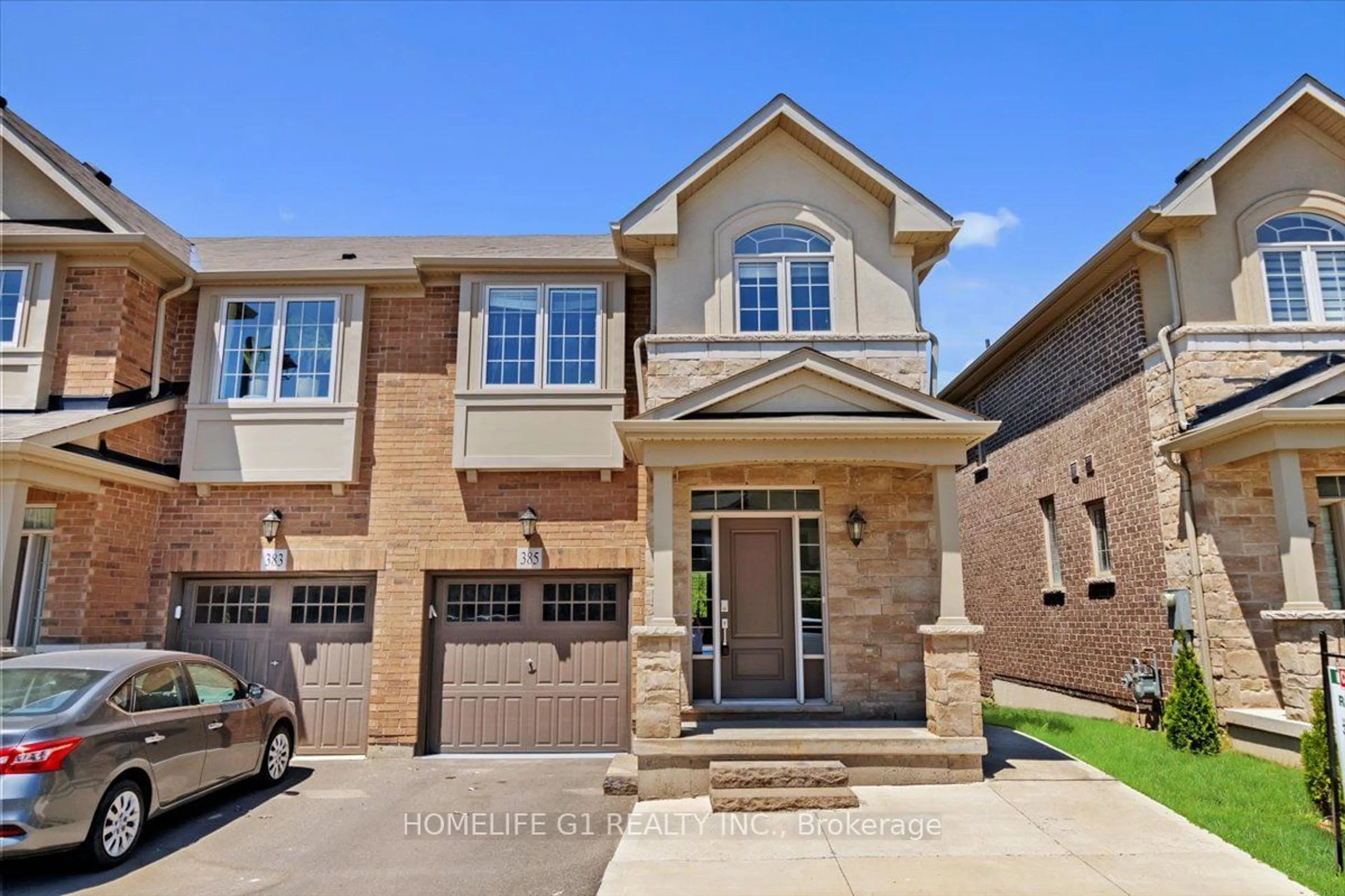 Home with brick exterior material for 385 Threshing Mill Blvd, Oakville Ontario L6H 0P5