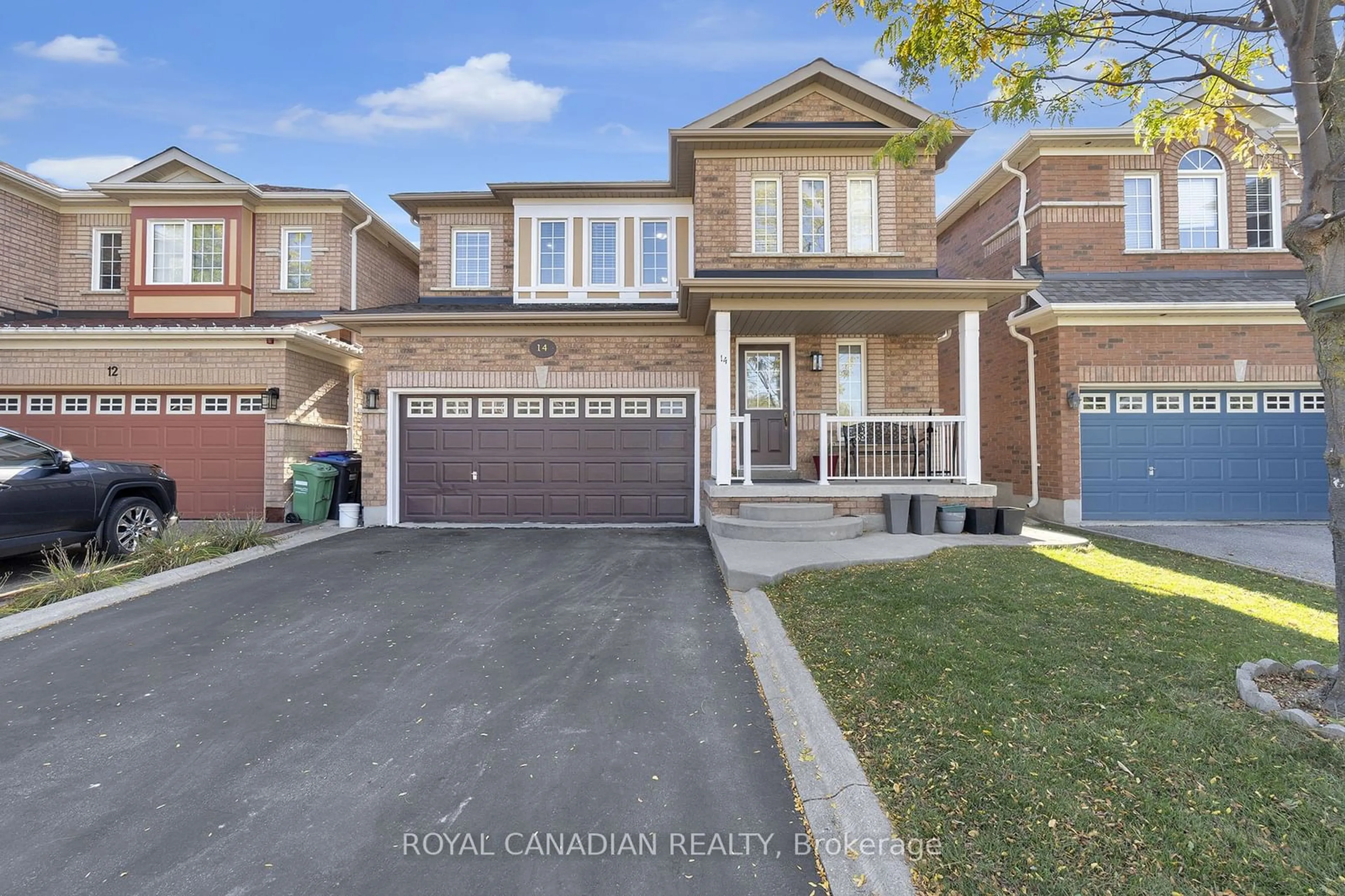 Frontside or backside of a home for 14 Sams Cres, Brampton Ontario L7A 3T8