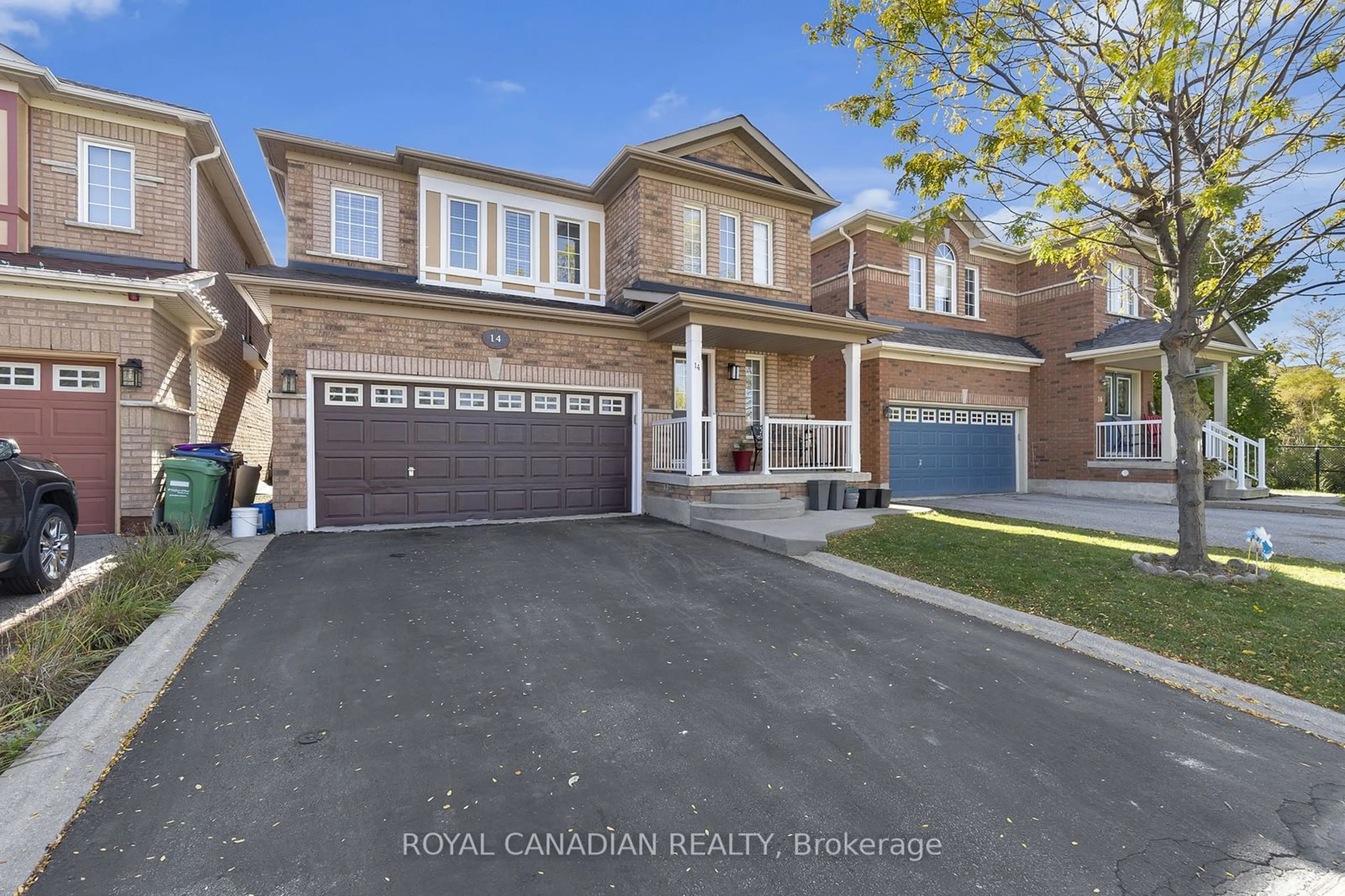 Frontside or backside of a home for 14 Sams Cres, Brampton Ontario L7A 3T8