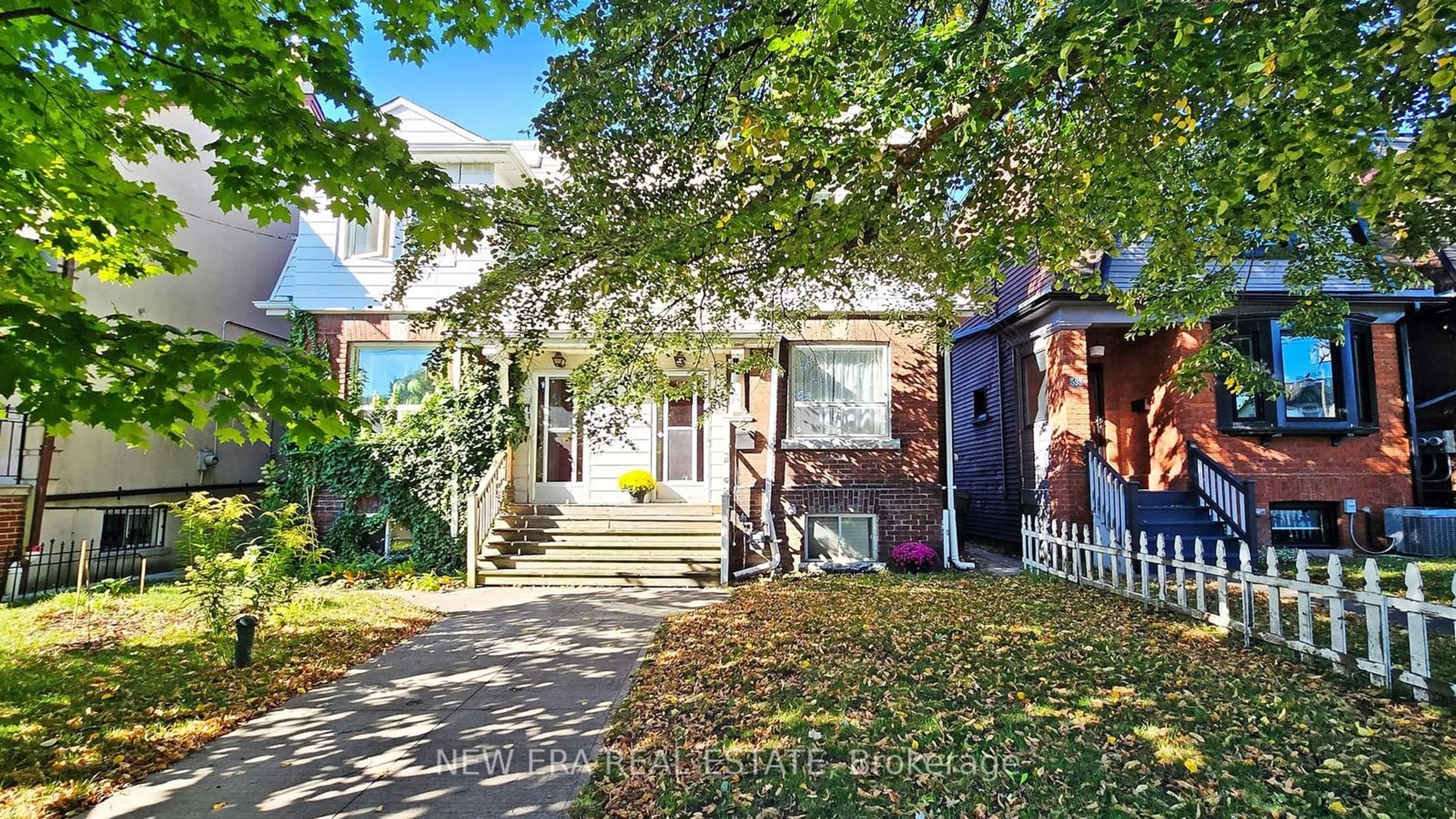 A pic from exterior of the house or condo, the street view for 596 St Clarens Ave, Toronto Ontario M6H 3W9