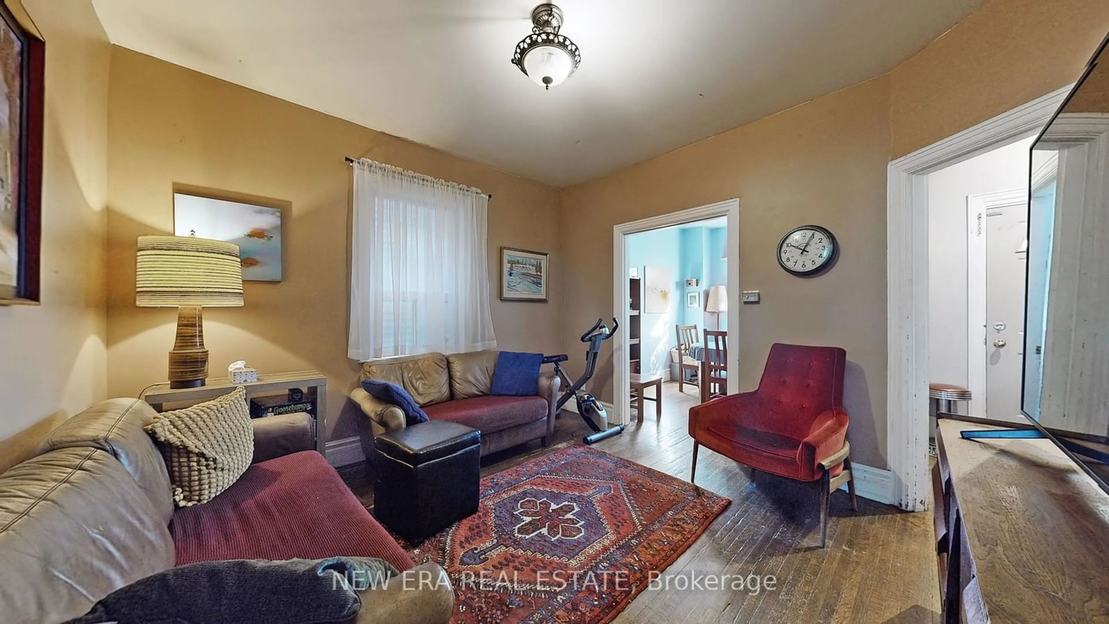 Living room, wood floors for 596 St Clarens Ave, Toronto Ontario M6H 3W9