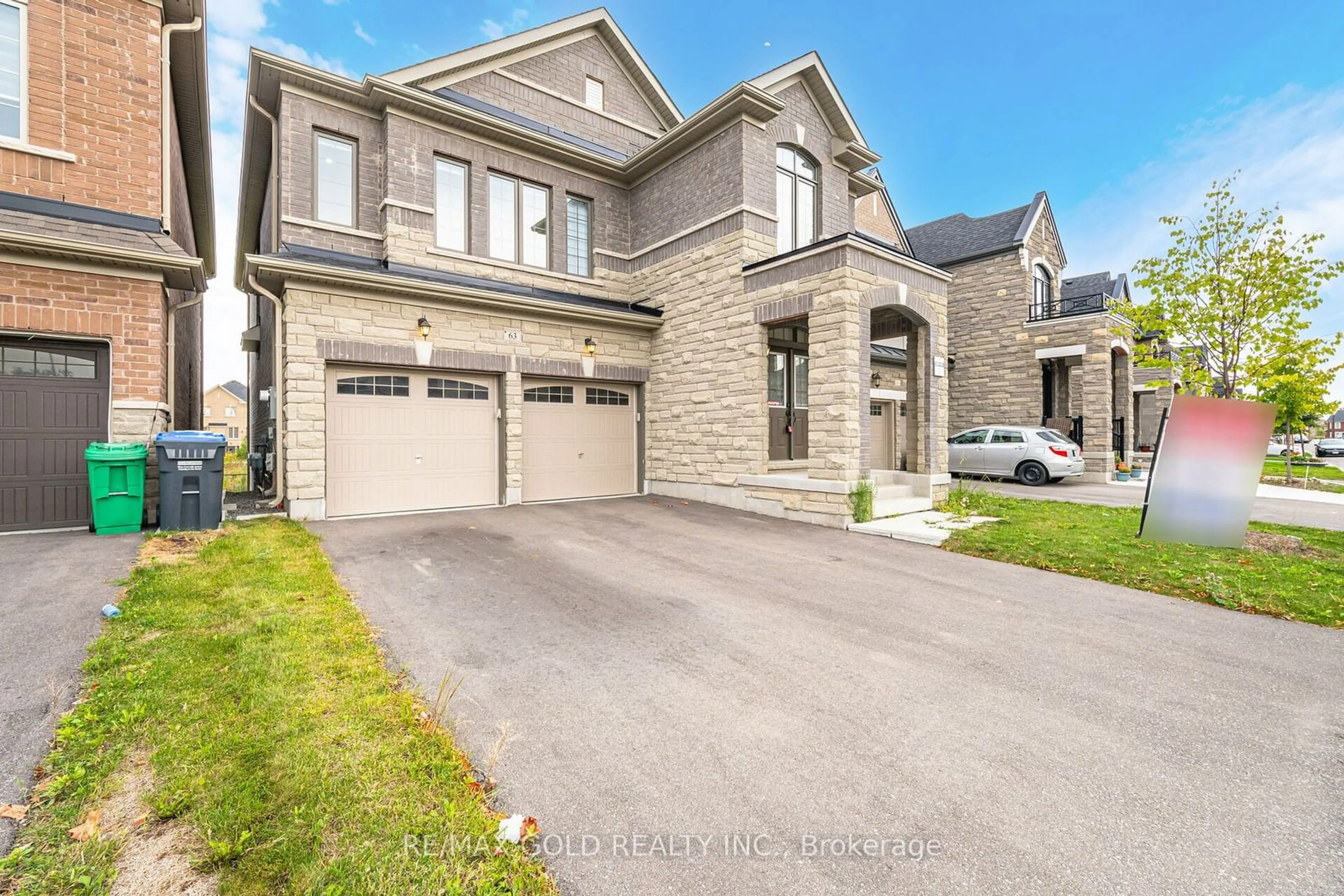 Frontside or backside of a home, the street view for 63 Hawtrey Rd, Brampton Ontario L7A 5B3