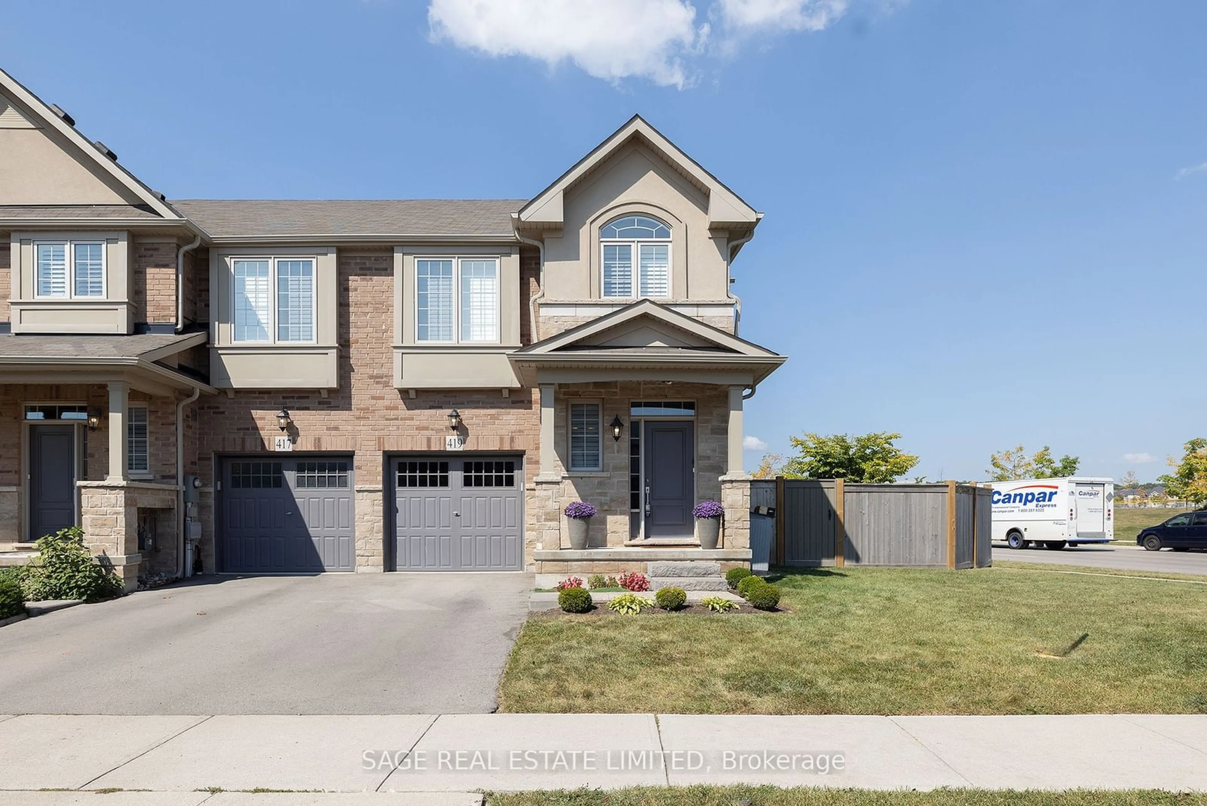 Frontside or backside of a home, the street view for 419 Wheat Boom Dr, Oakville Ontario L6H 0R4