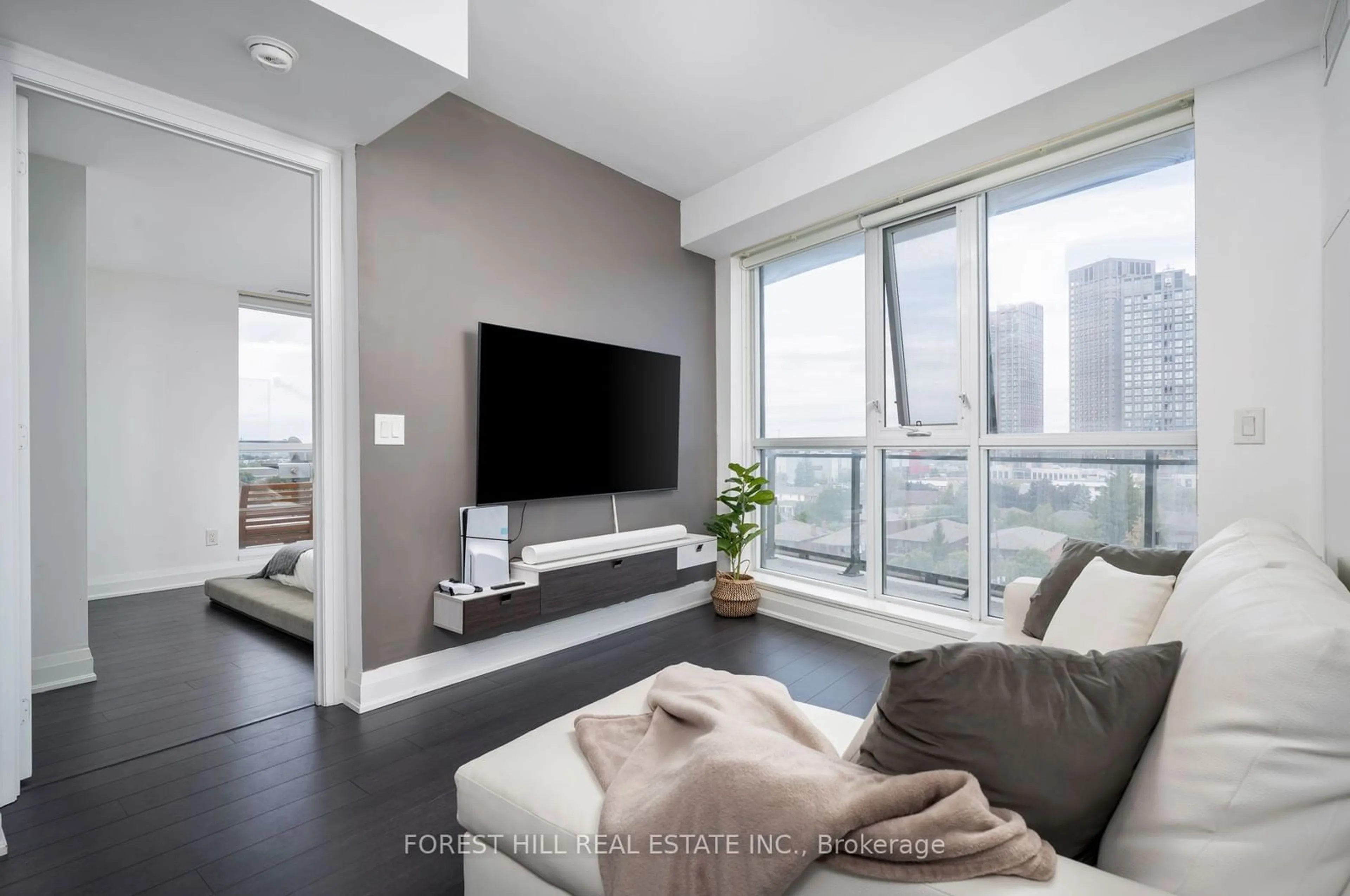 Living room, wood floors for 16 McAdam Ave #704, Toronto Ontario M6A 0B9