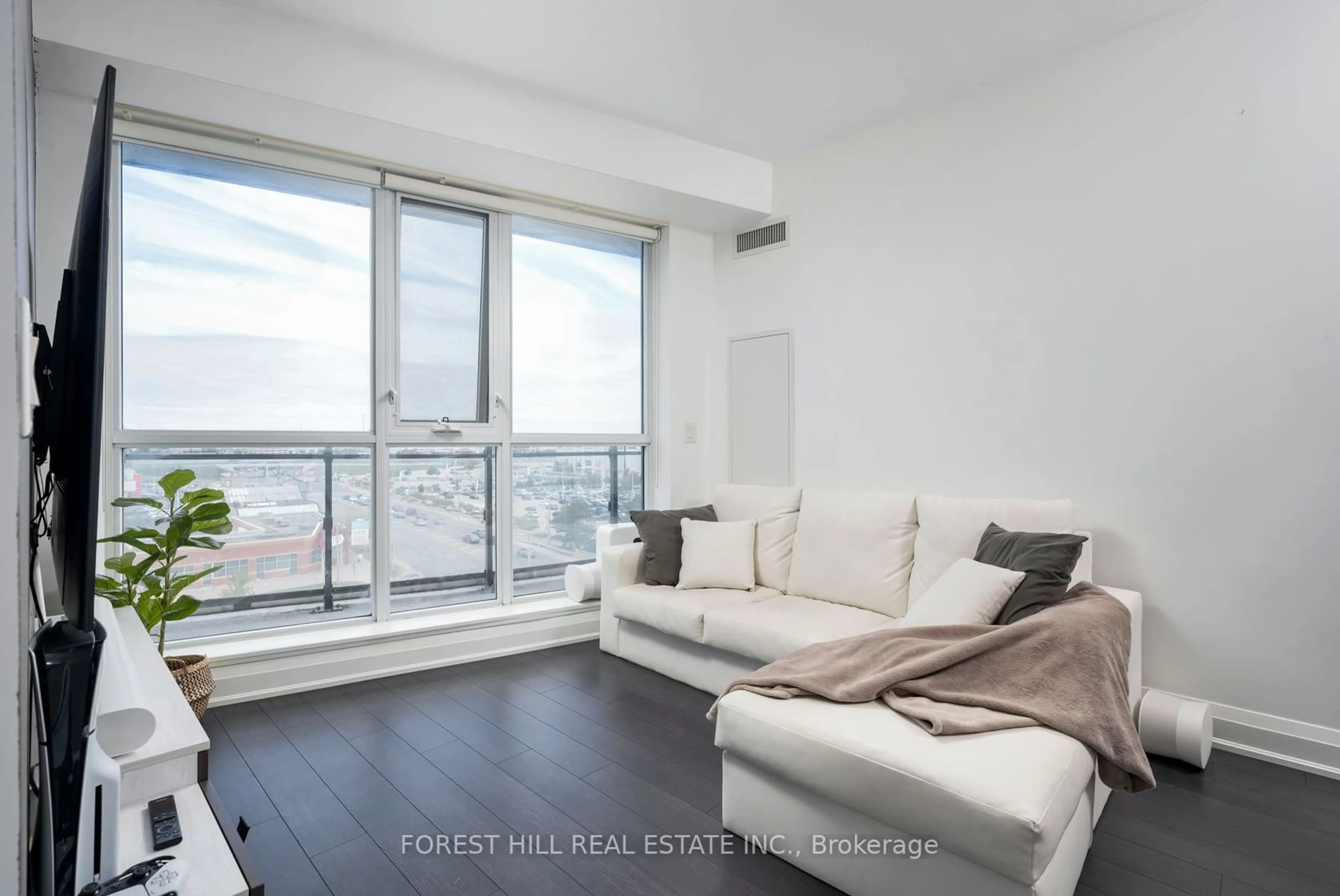 Living room, wood floors for 16 McAdam Ave #704, Toronto Ontario M6A 0B9