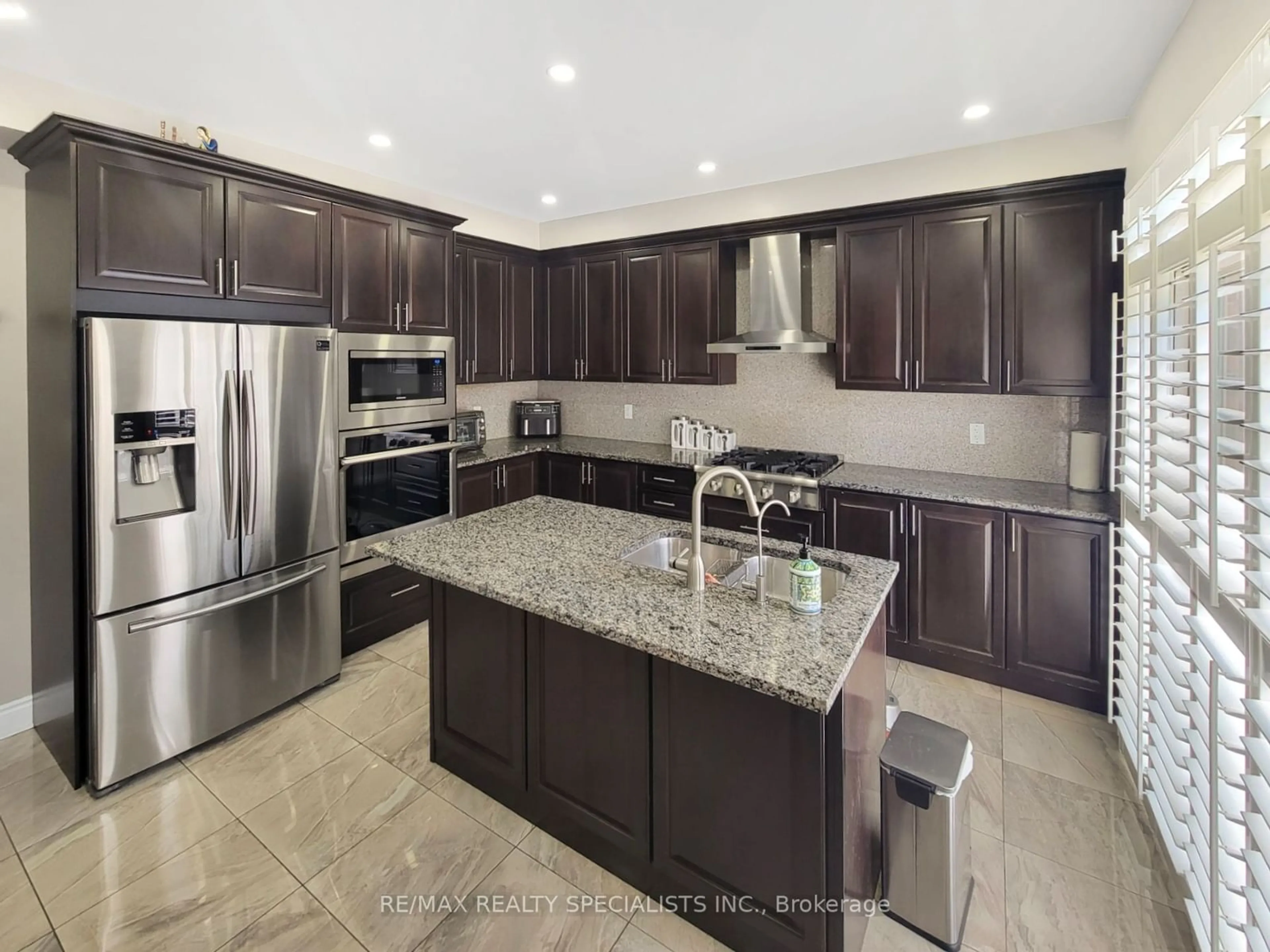 Contemporary kitchen, wood floors for 8 Mecca St, Brampton Ontario L6P 4K2