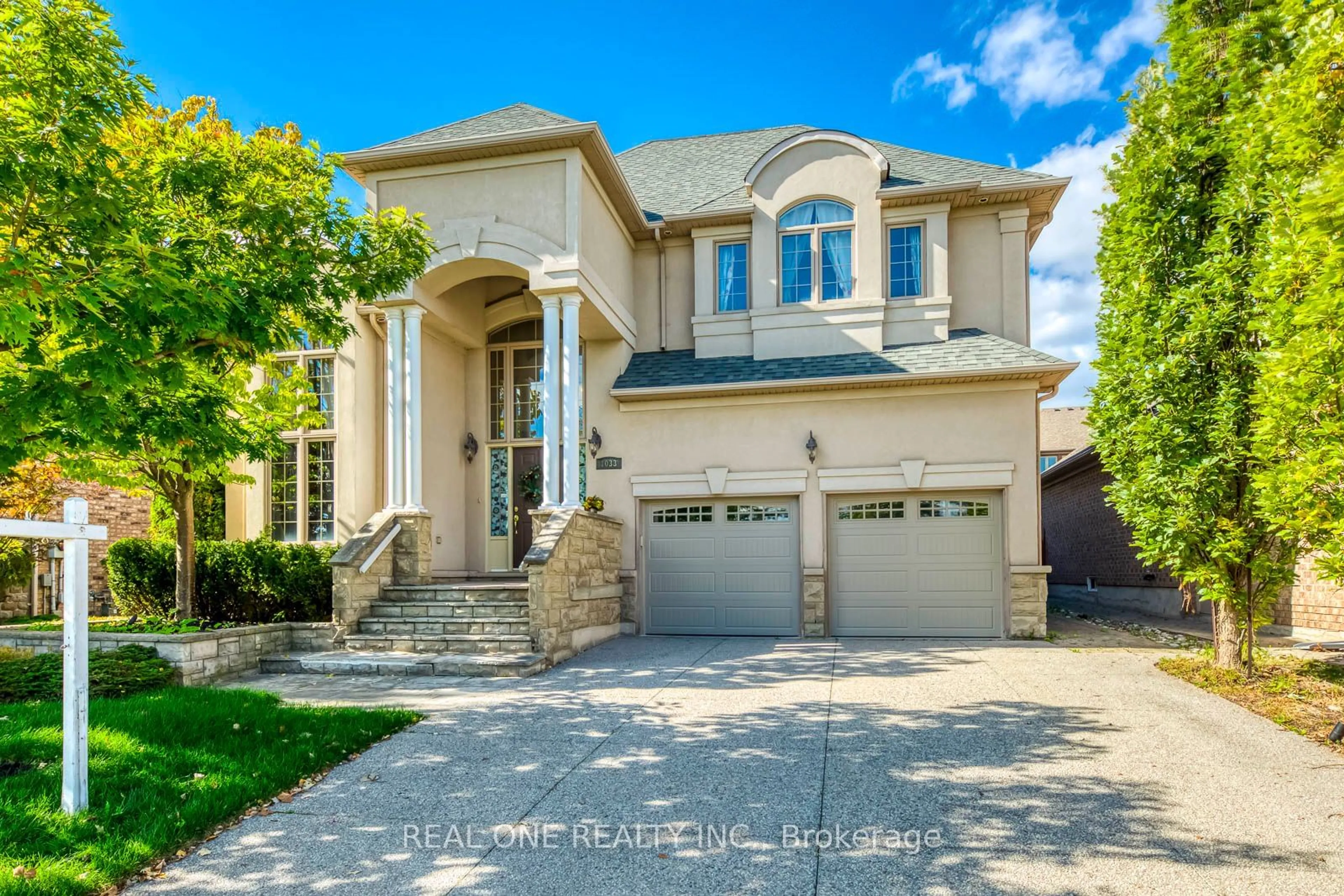 Frontside or backside of a home, the street view for 1033 Kestell Blvd, Oakville Ontario L6H 7L7