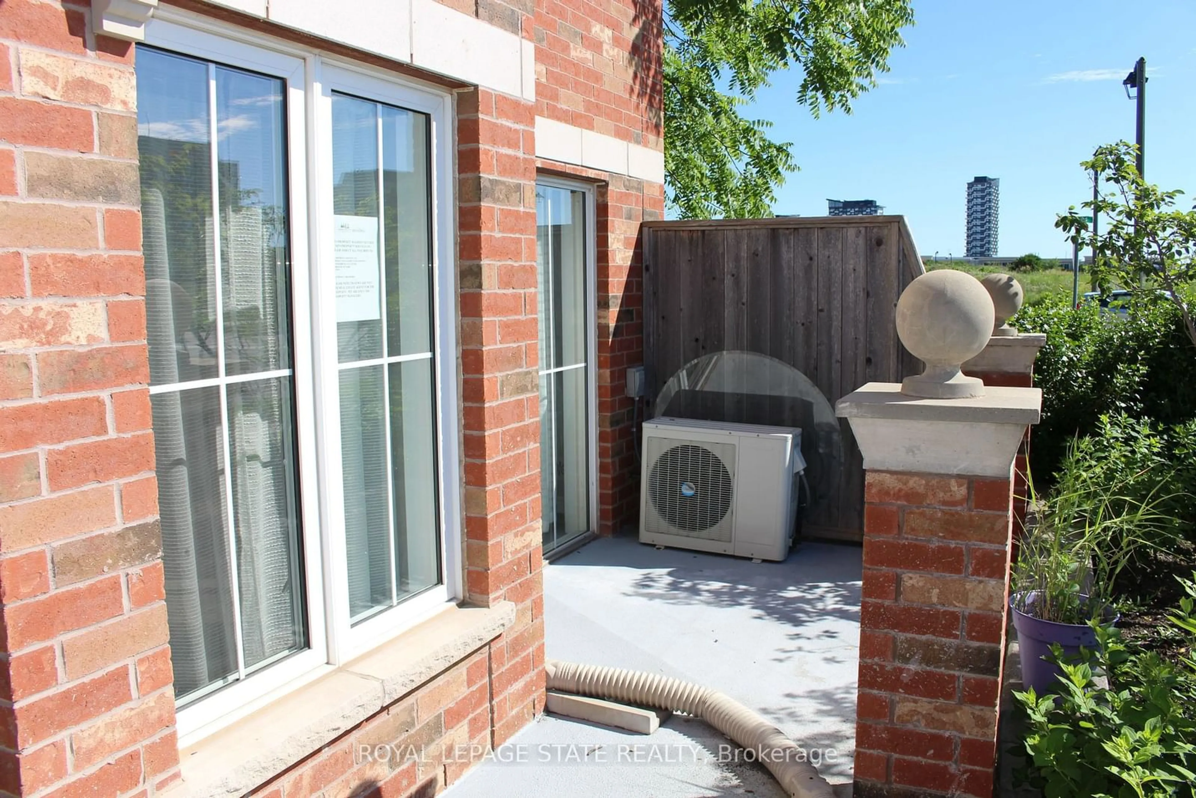 Patio, the fenced backyard for 51 Hays Blvd #1, Oakville Ontario L6H 0J1