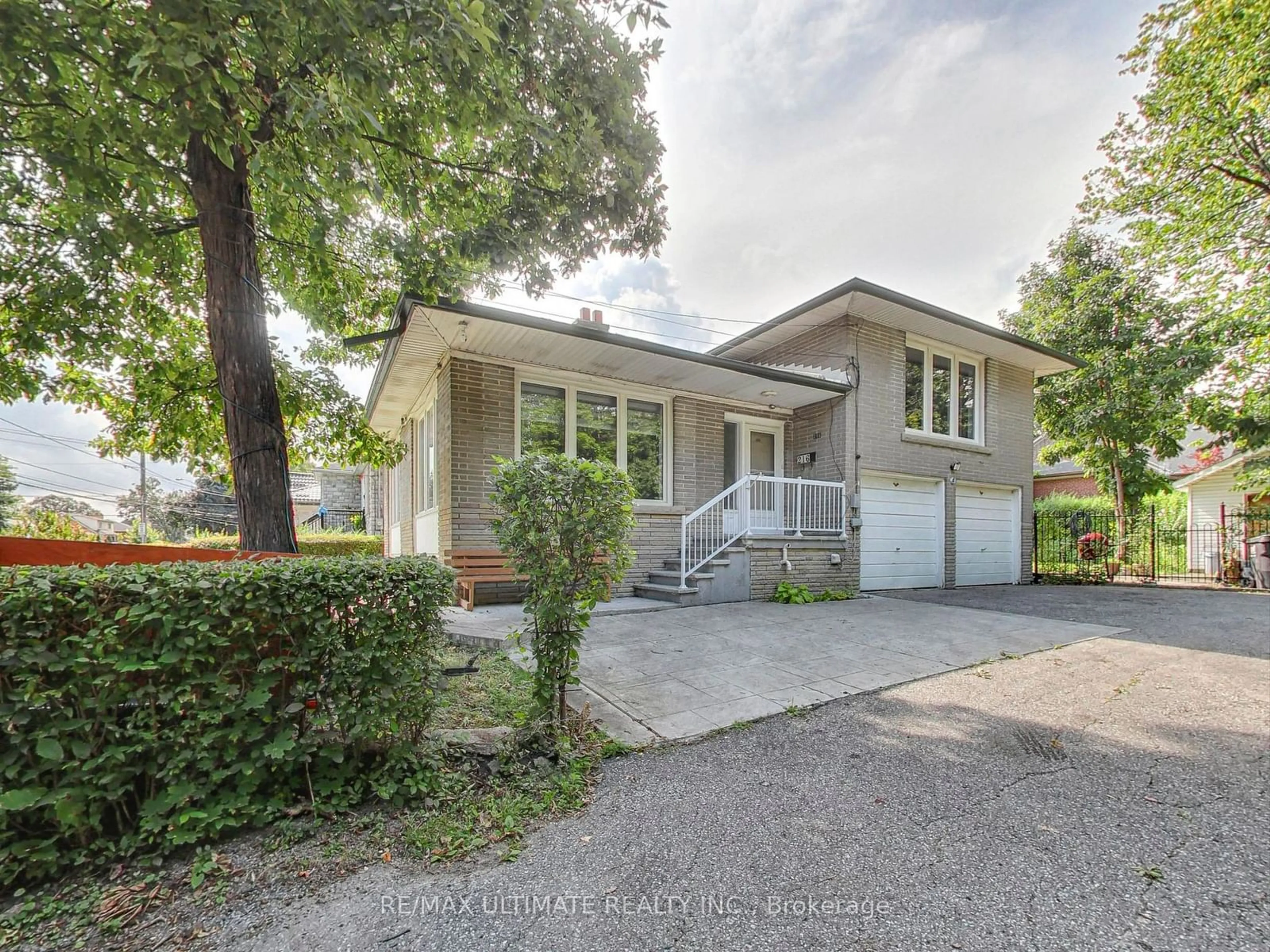 Frontside or backside of a home, the street view for 216 Gary Dr, Toronto Ontario M9N 2M7