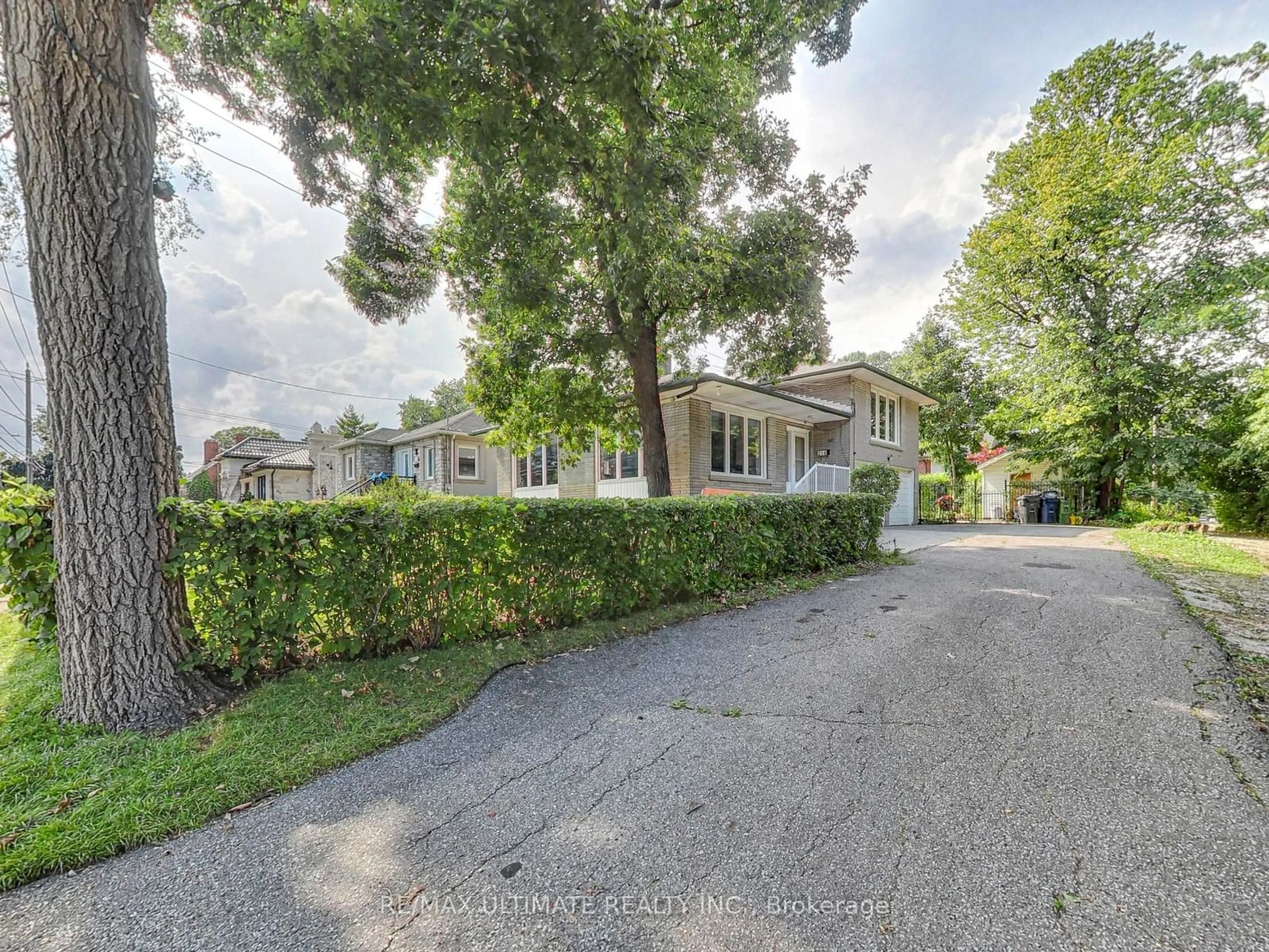 Frontside or backside of a home, the street view for 216 Gary Dr, Toronto Ontario M9N 2M7