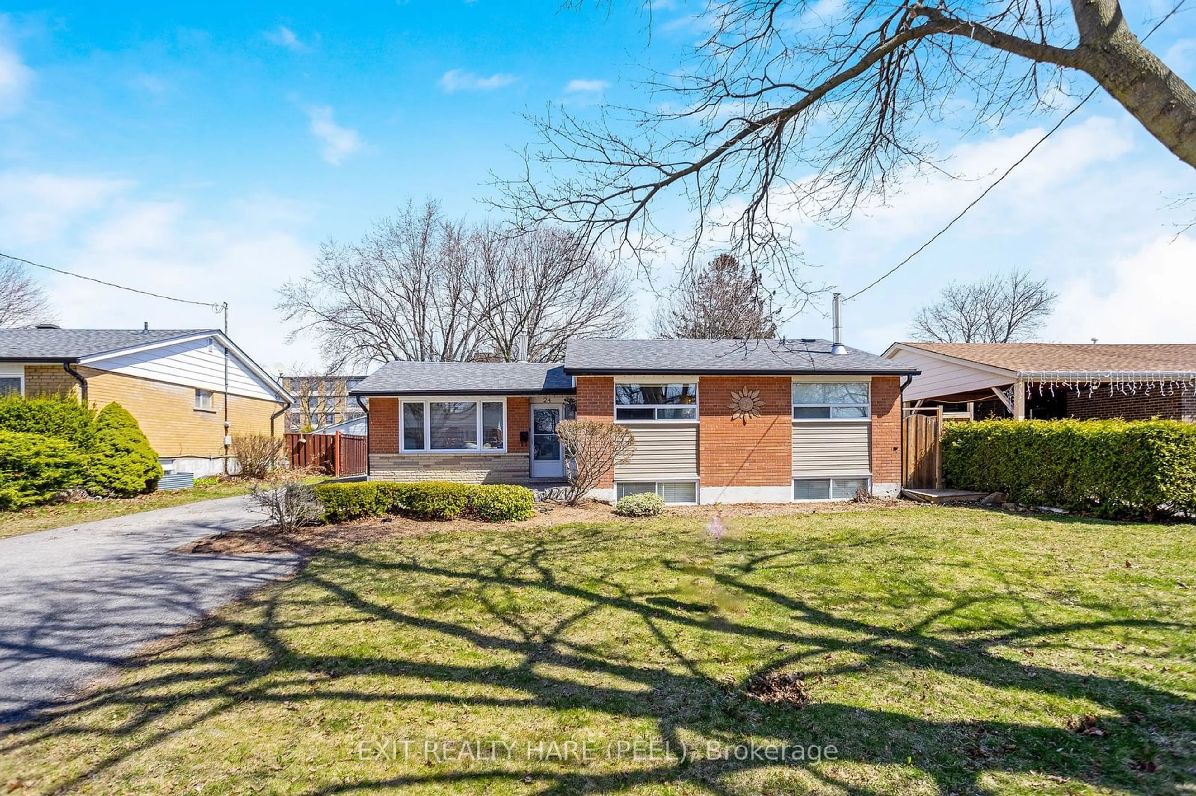 Frontside or backside of a home, the fenced backyard for 24 Hadrina St, Brampton Ontario L6X 2J6