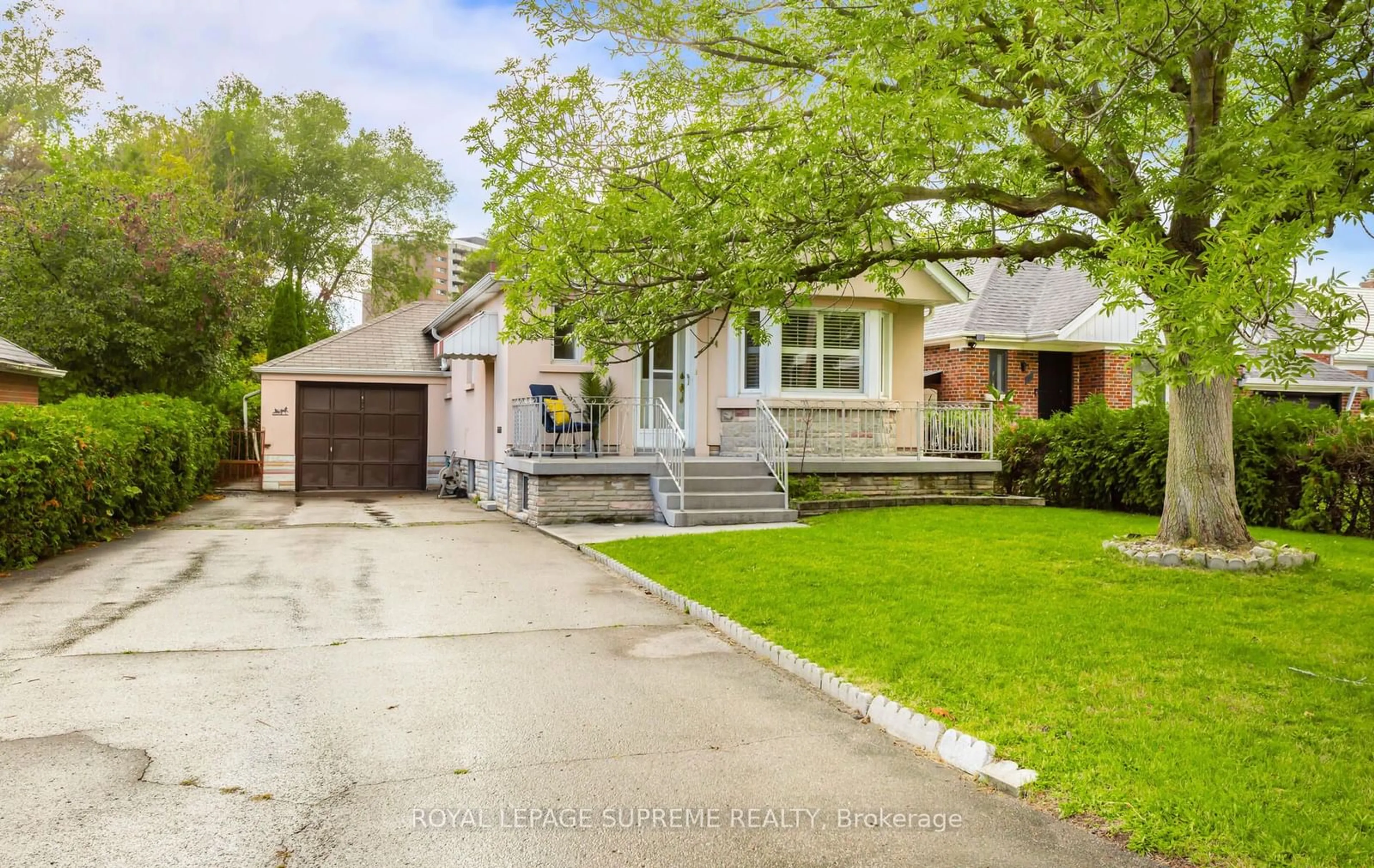 Frontside or backside of a home, the street view for 34 Woodgate Dr, Toronto Ontario M6N 4W3