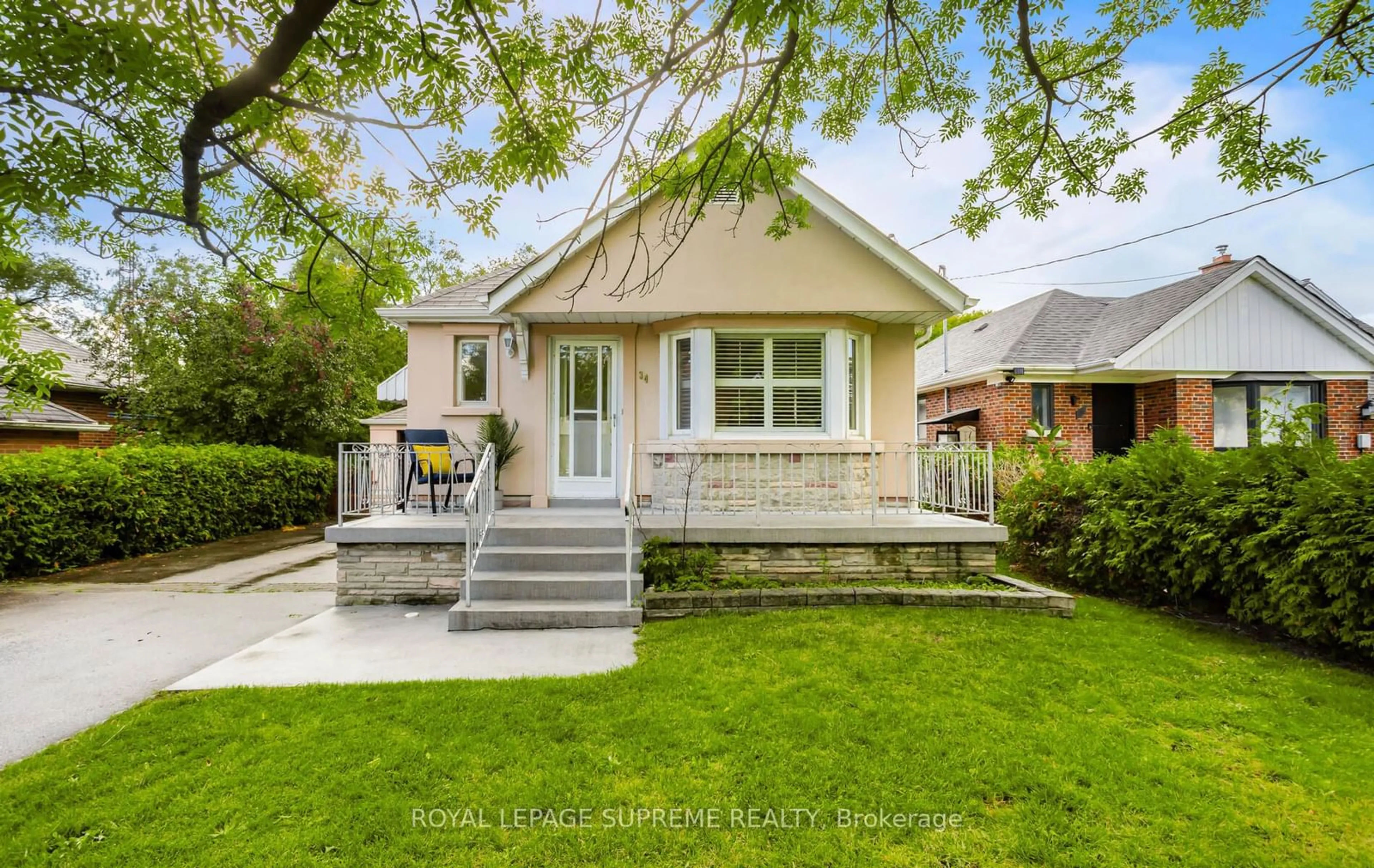 Frontside or backside of a home, cottage for 34 Woodgate Dr, Toronto Ontario M6N 4W3