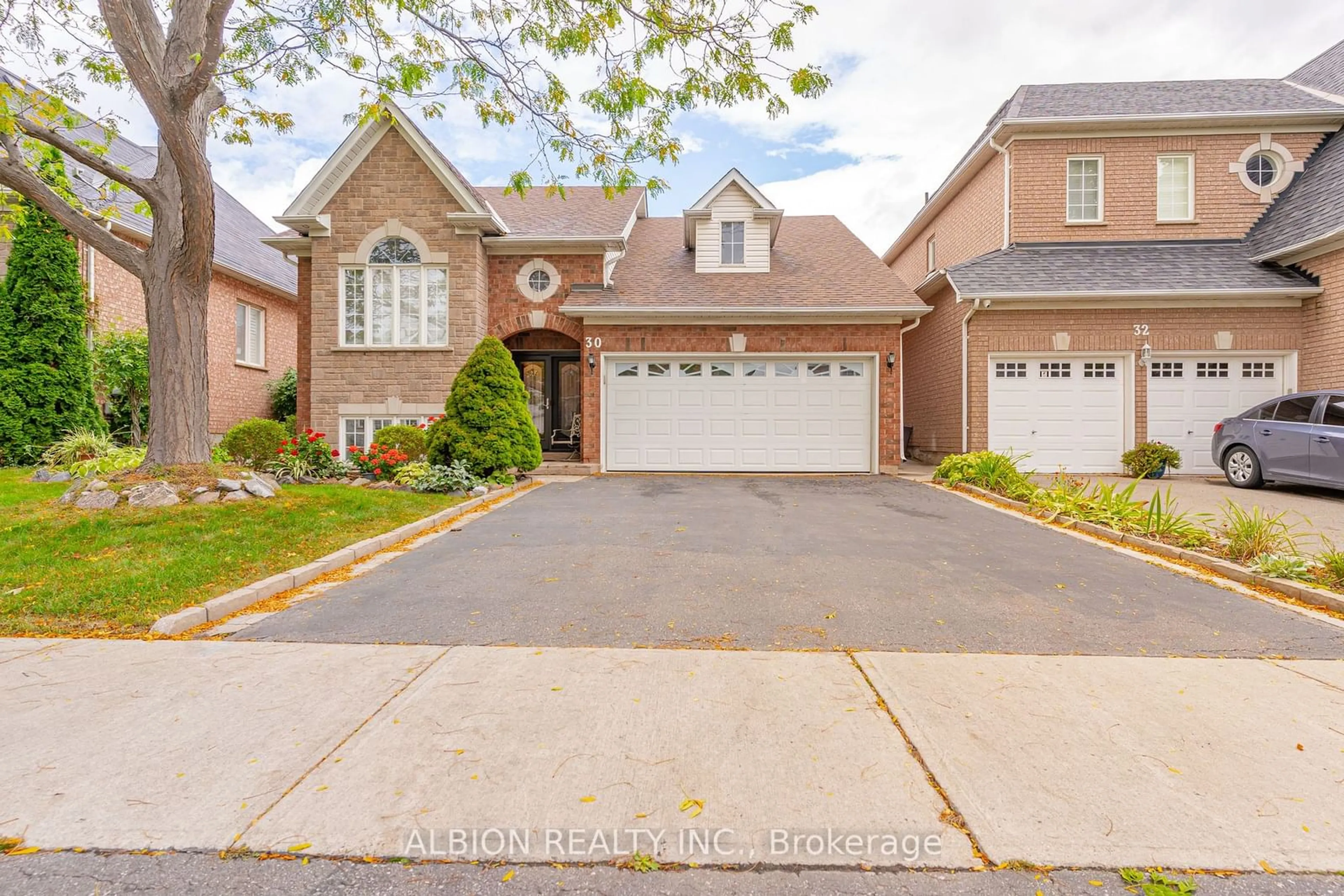 Frontside or backside of a home, the street view for 30 Rushbrook Dr, Brampton Ontario L6P 1E4