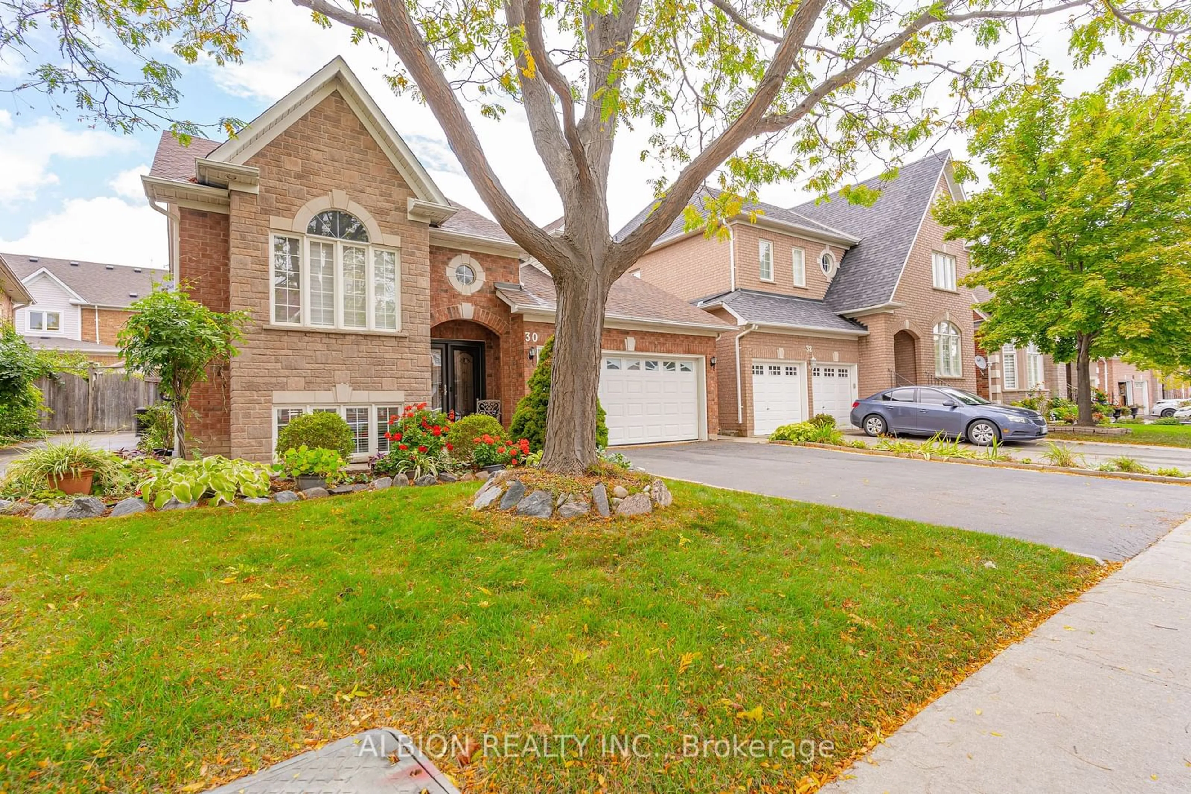 Home with brick exterior material for 30 Rushbrook Dr, Brampton Ontario L6P 1E4