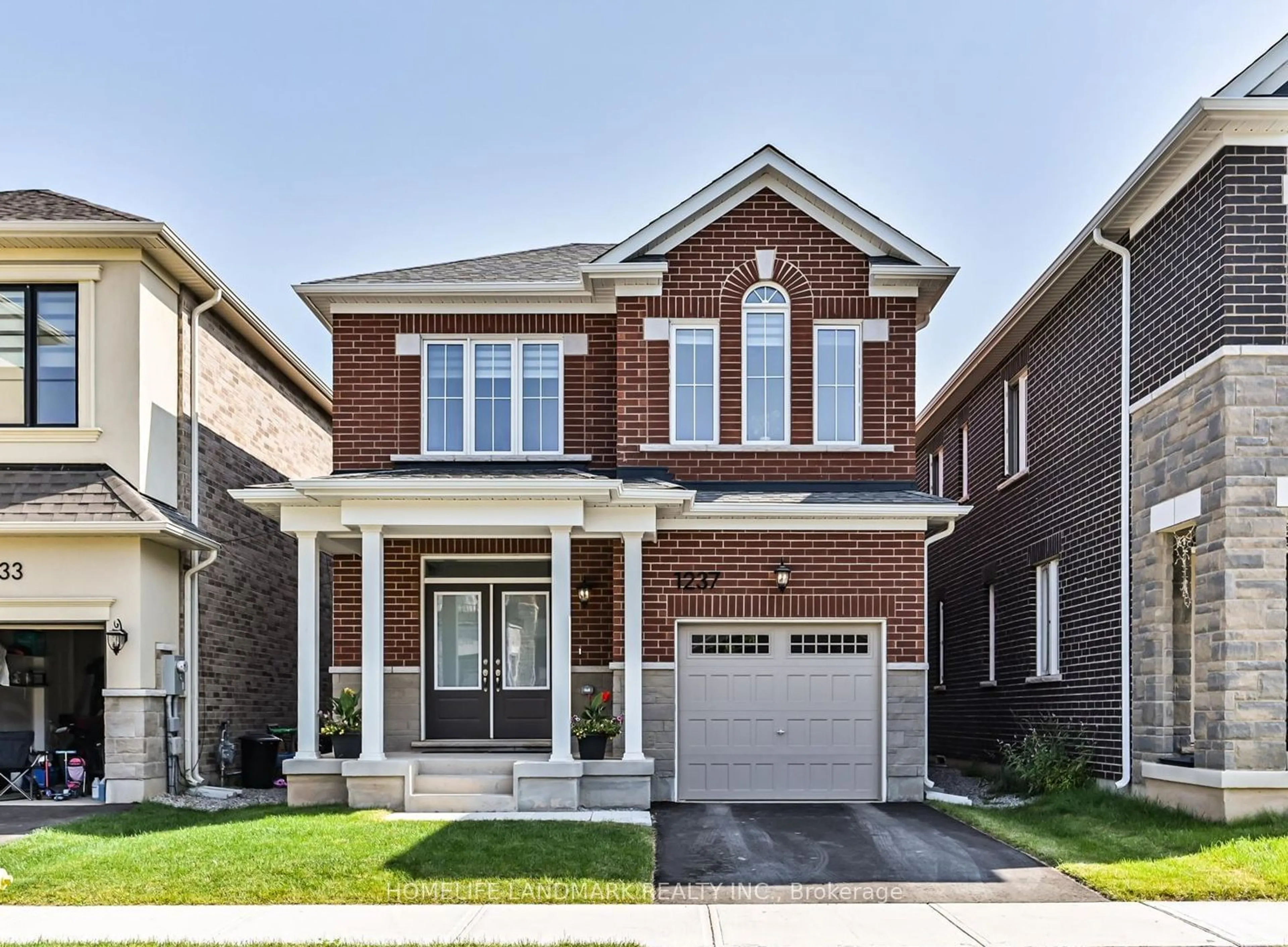 Home with brick exterior material for 1237 Muskoka Hts, Milton Ontario L9E 1Y6