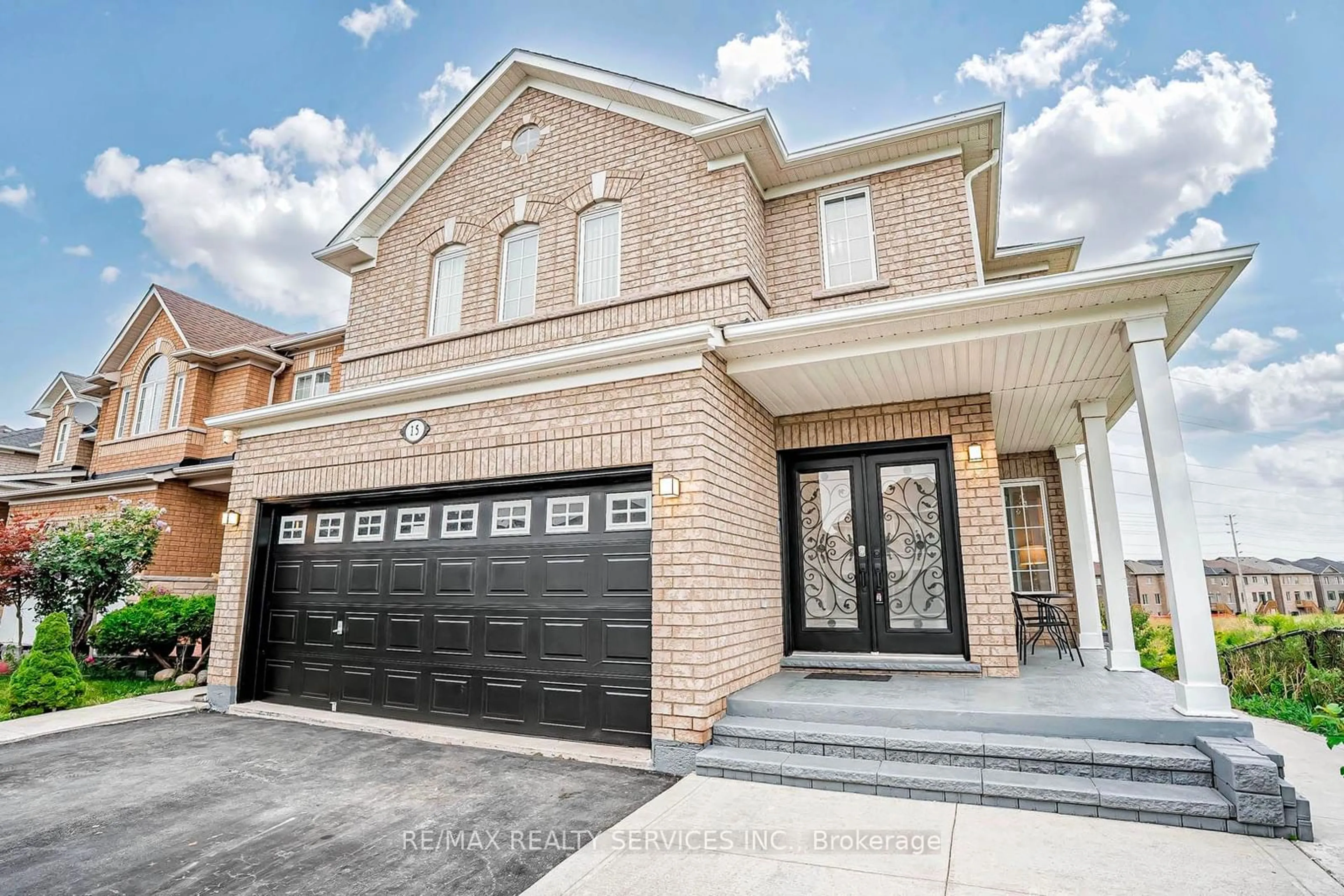 Home with brick exterior material for 15 Roundstone Dr, Brampton Ontario L6X 0K7