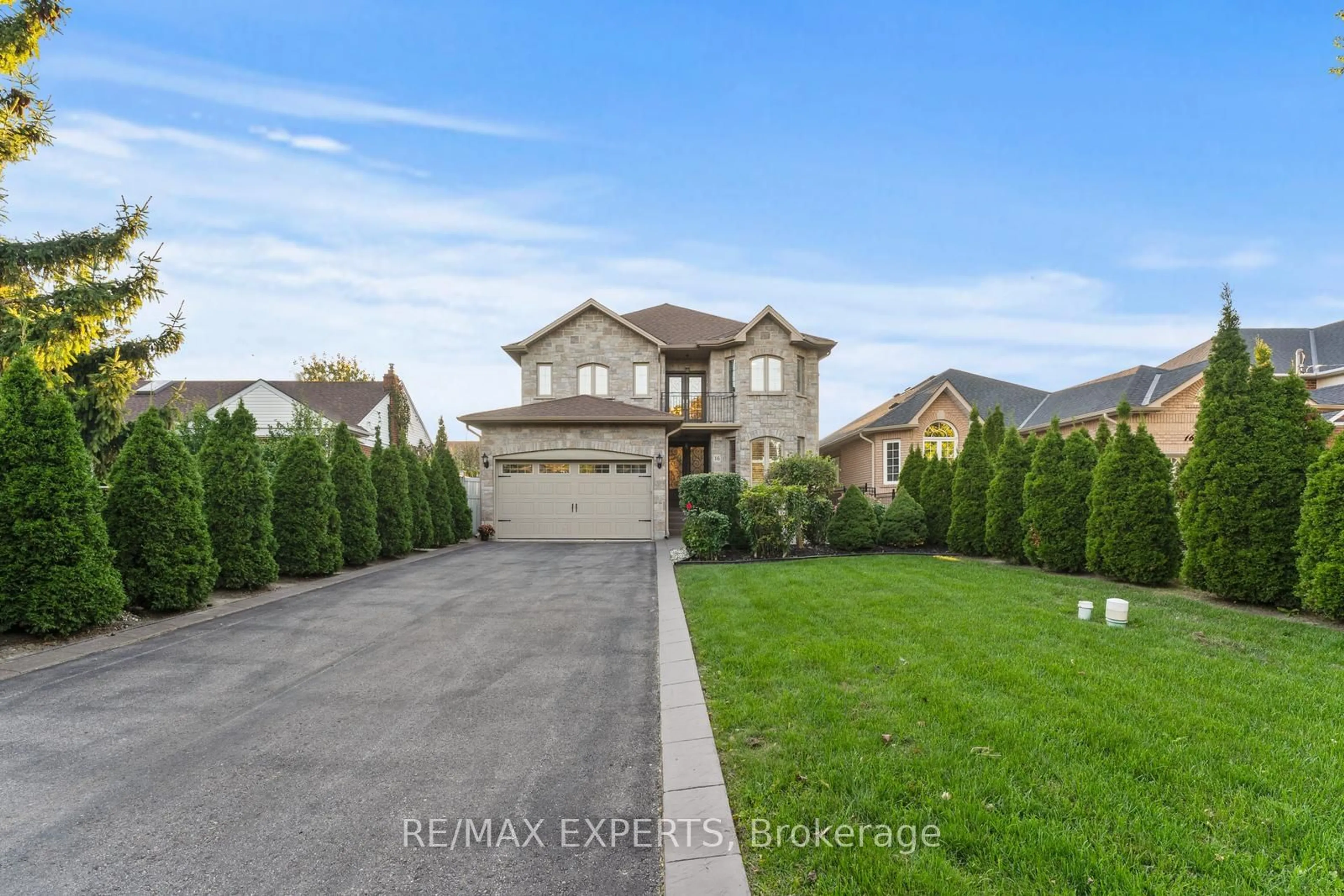 Frontside or backside of a home, the fenced backyard for 16 Windsor Rd, Toronto Ontario M9R 3G1