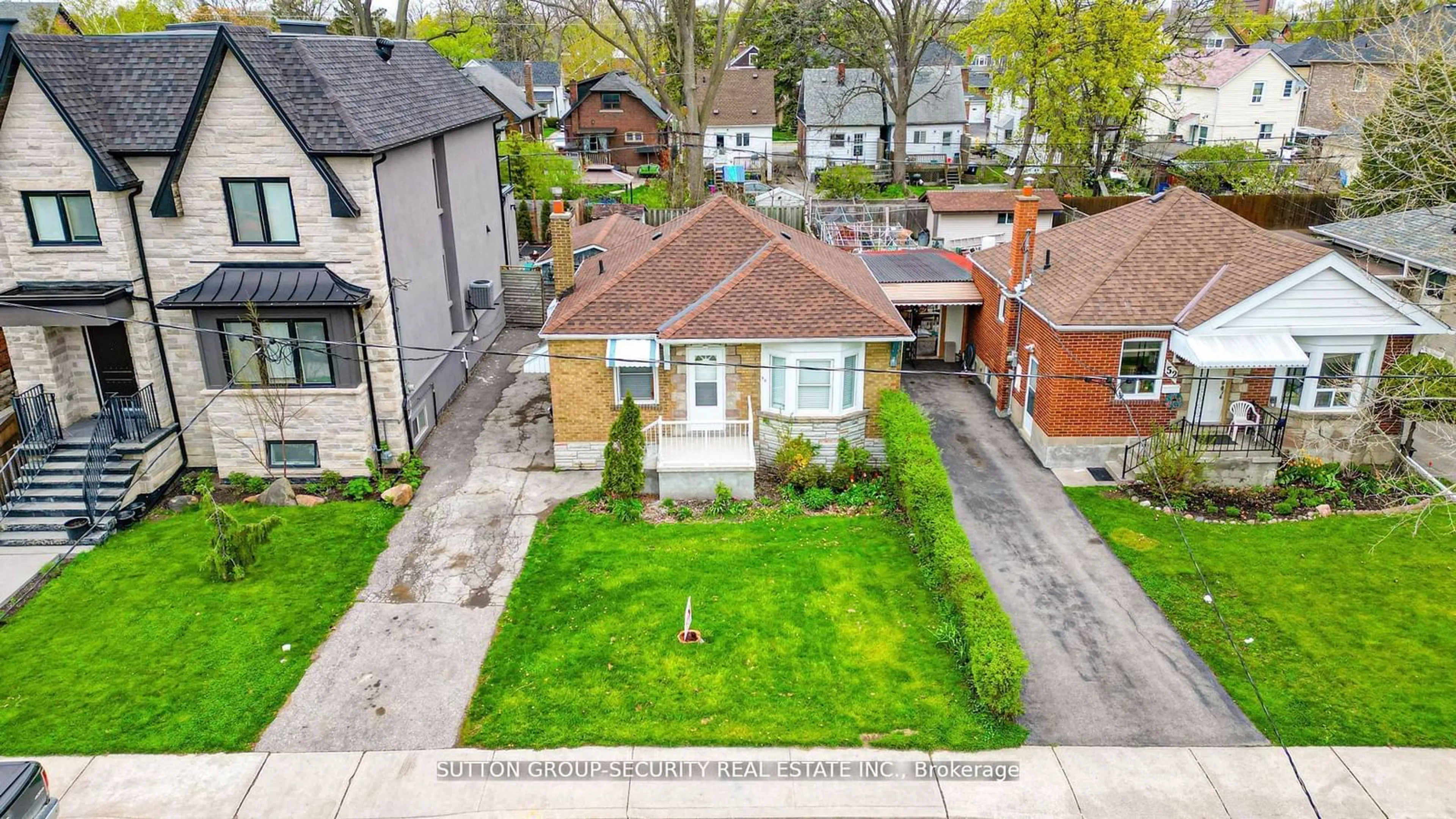 Frontside or backside of a home, the street view for 50 William St, Toronto Ontario M9N 2G7