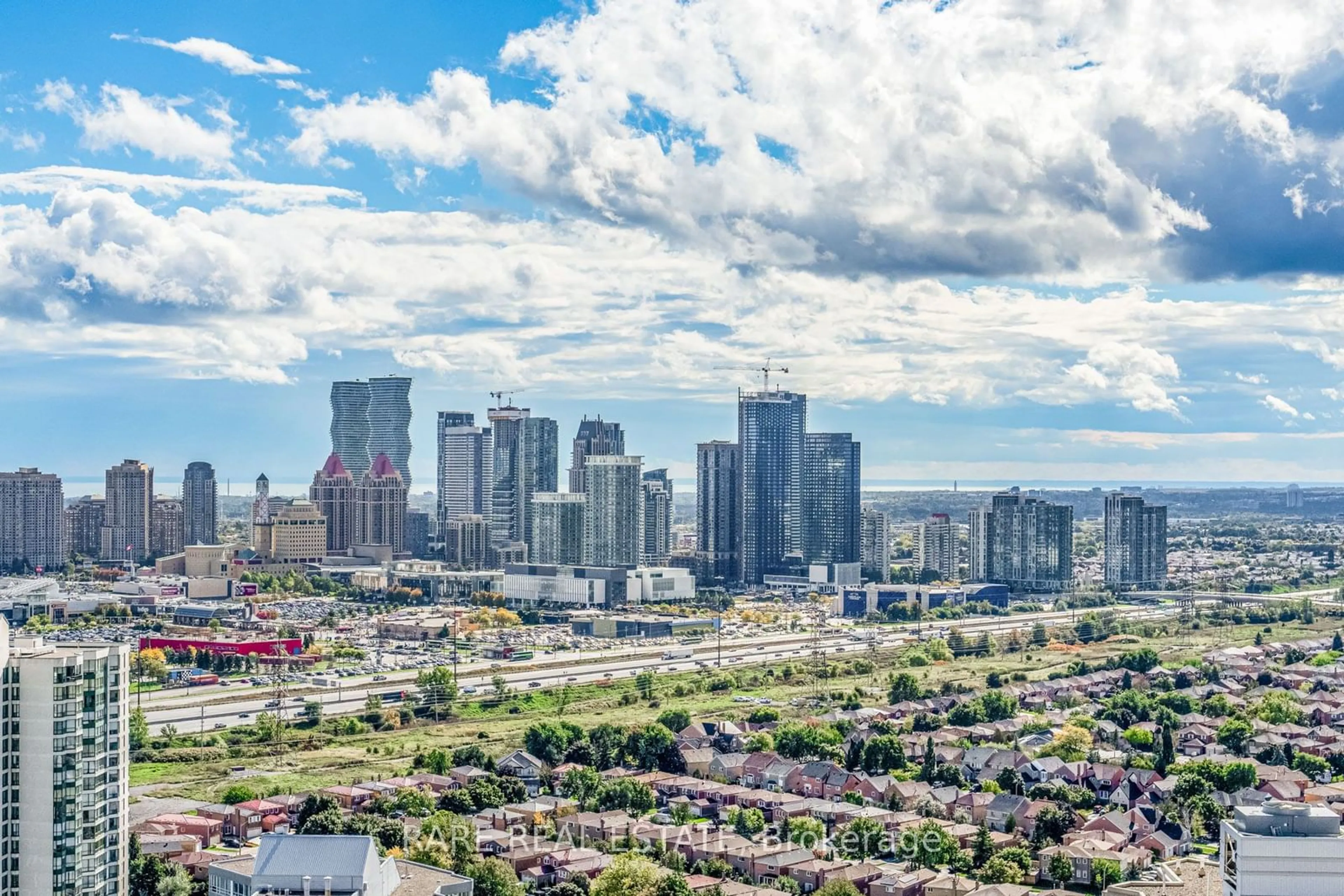 A pic from outside/outdoor area/front of a property/back of a property/a pic from drone, city buildings view from balcony for 25 Kingsbridge Garden Circ #TPH6, Mississauga Ontario L5R 4B1