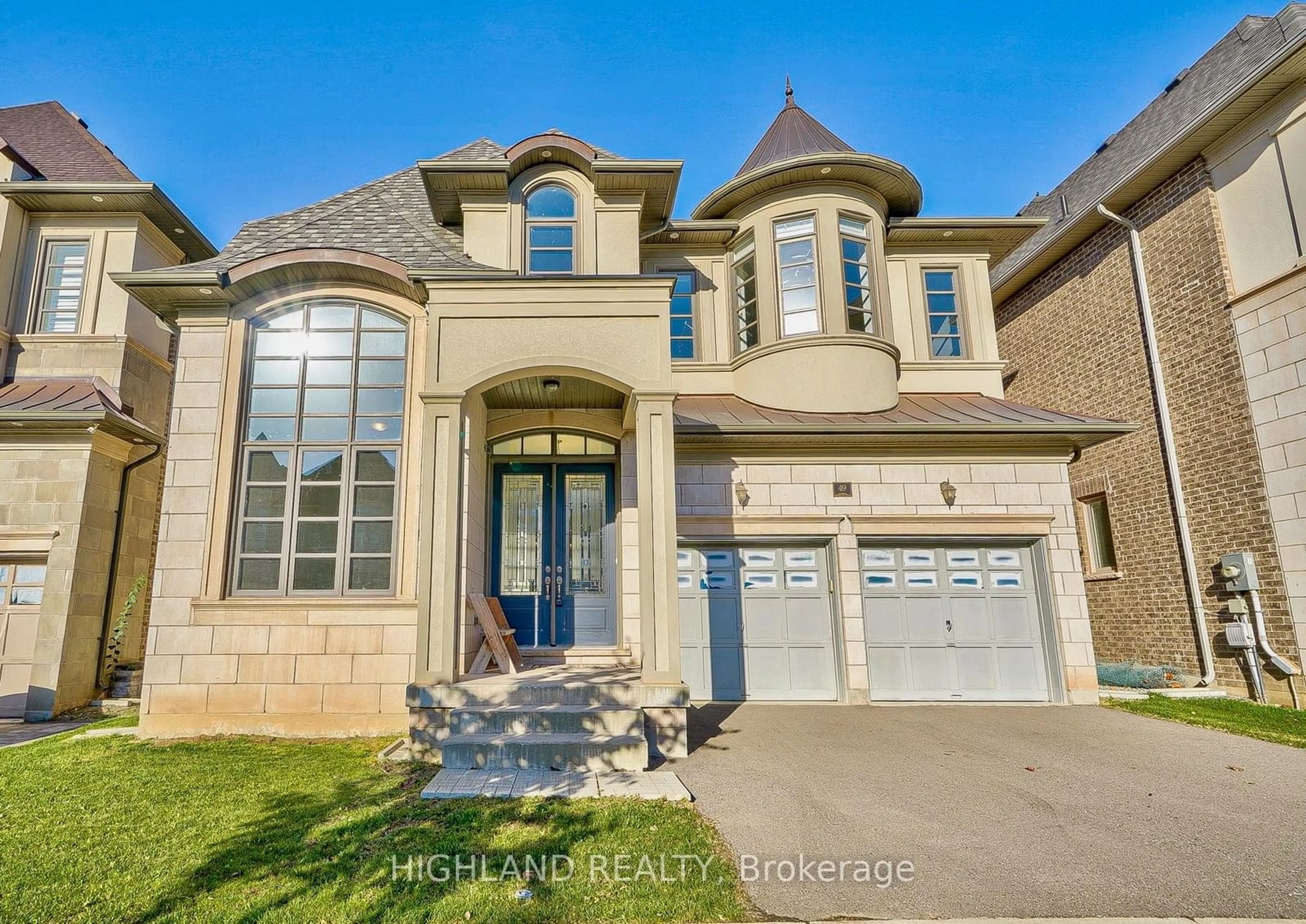 Frontside or backside of a home, the street view for 49 Threshing Mill Blvd, Oakville Ontario L6H 0V6