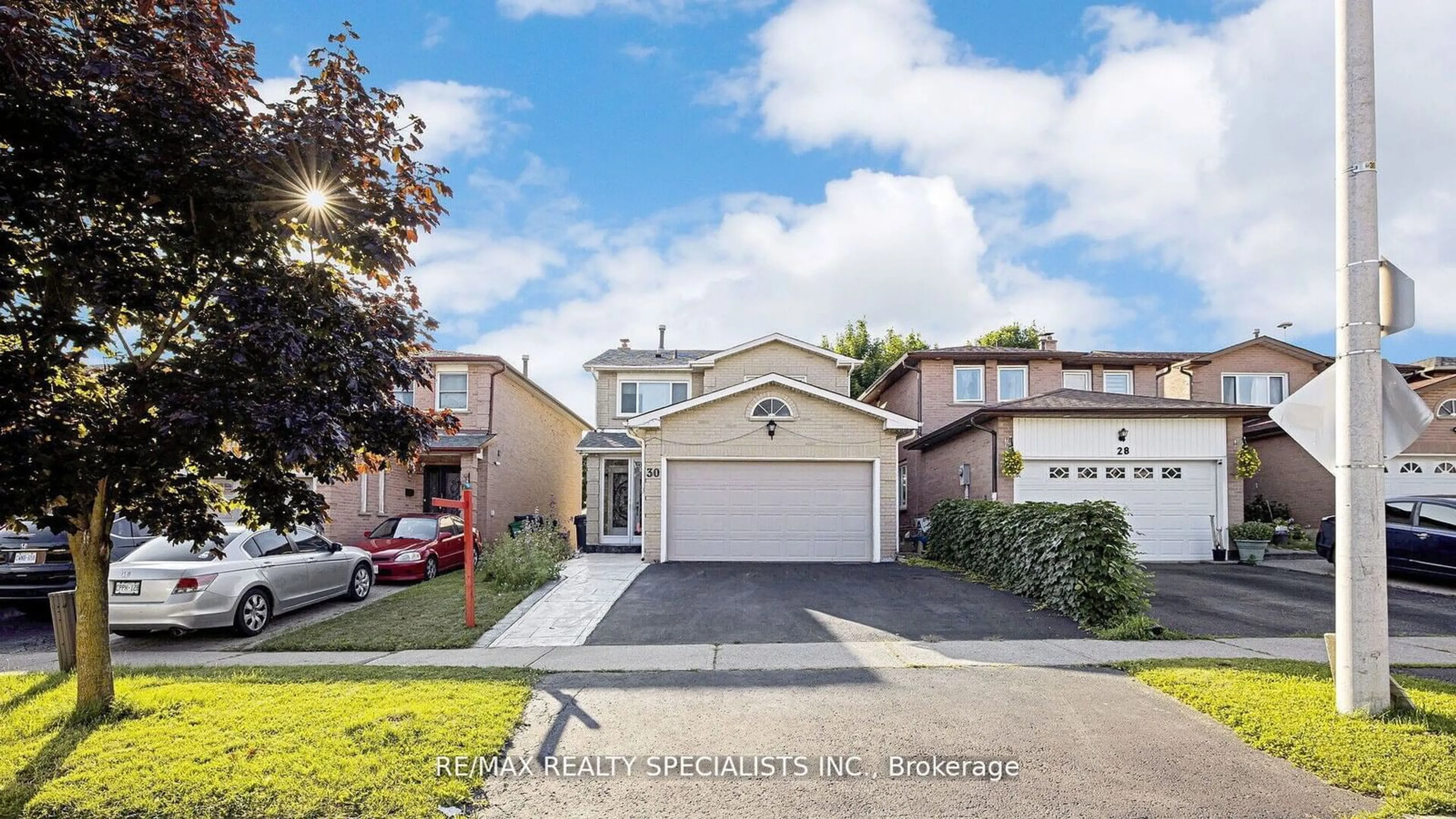 Frontside or backside of a home, the street view for 30 Bach Blvd, Brampton Ontario L6Y 2P6