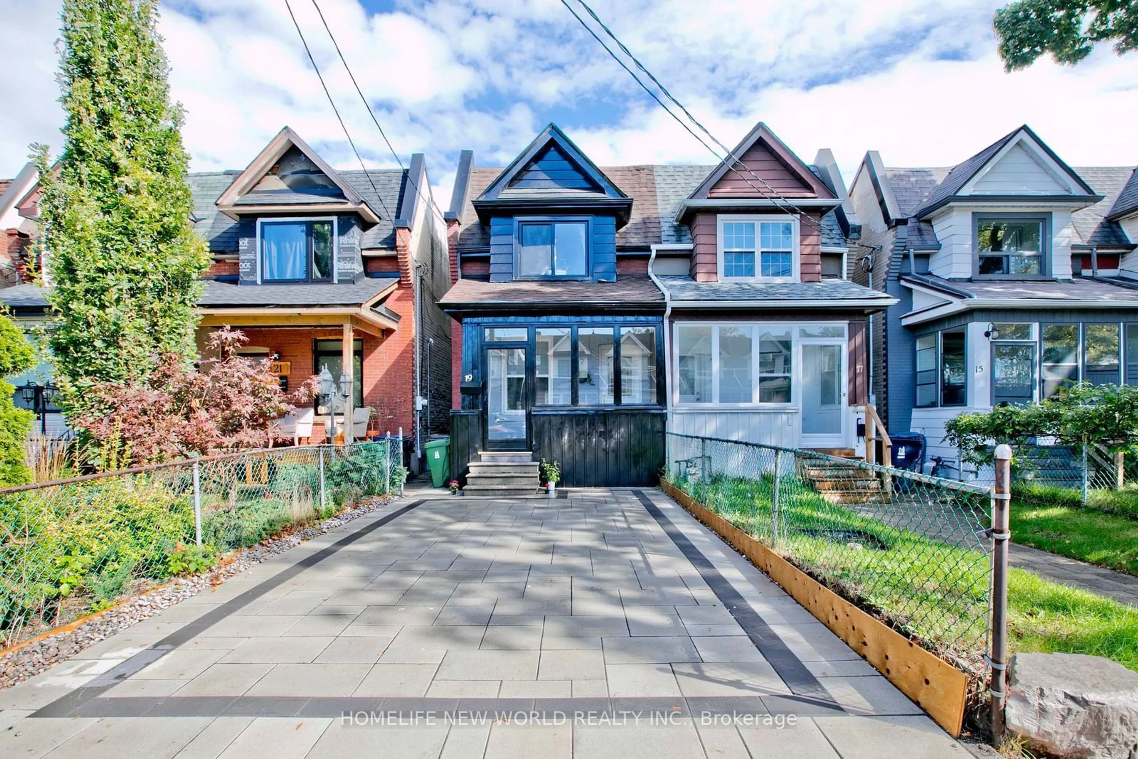 Frontside or backside of a home, the street view for 19 Britannia Ave, Toronto Ontario M6N 3T6