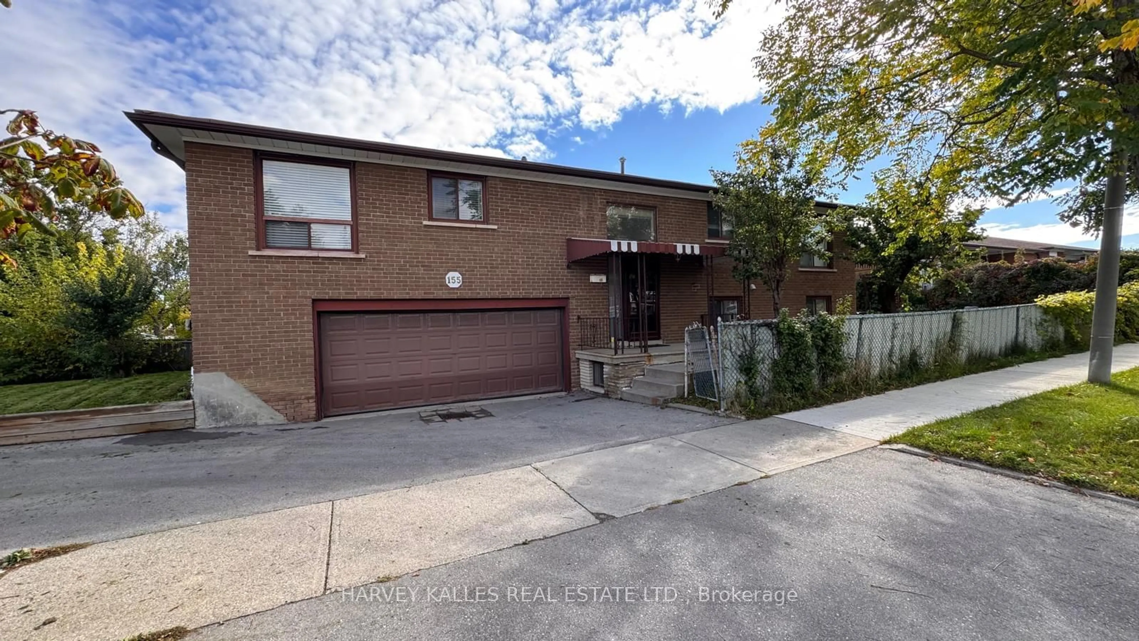 Frontside or backside of a home, the street view for 155 Plunkett Rd, Toronto Ontario M9L 2J7