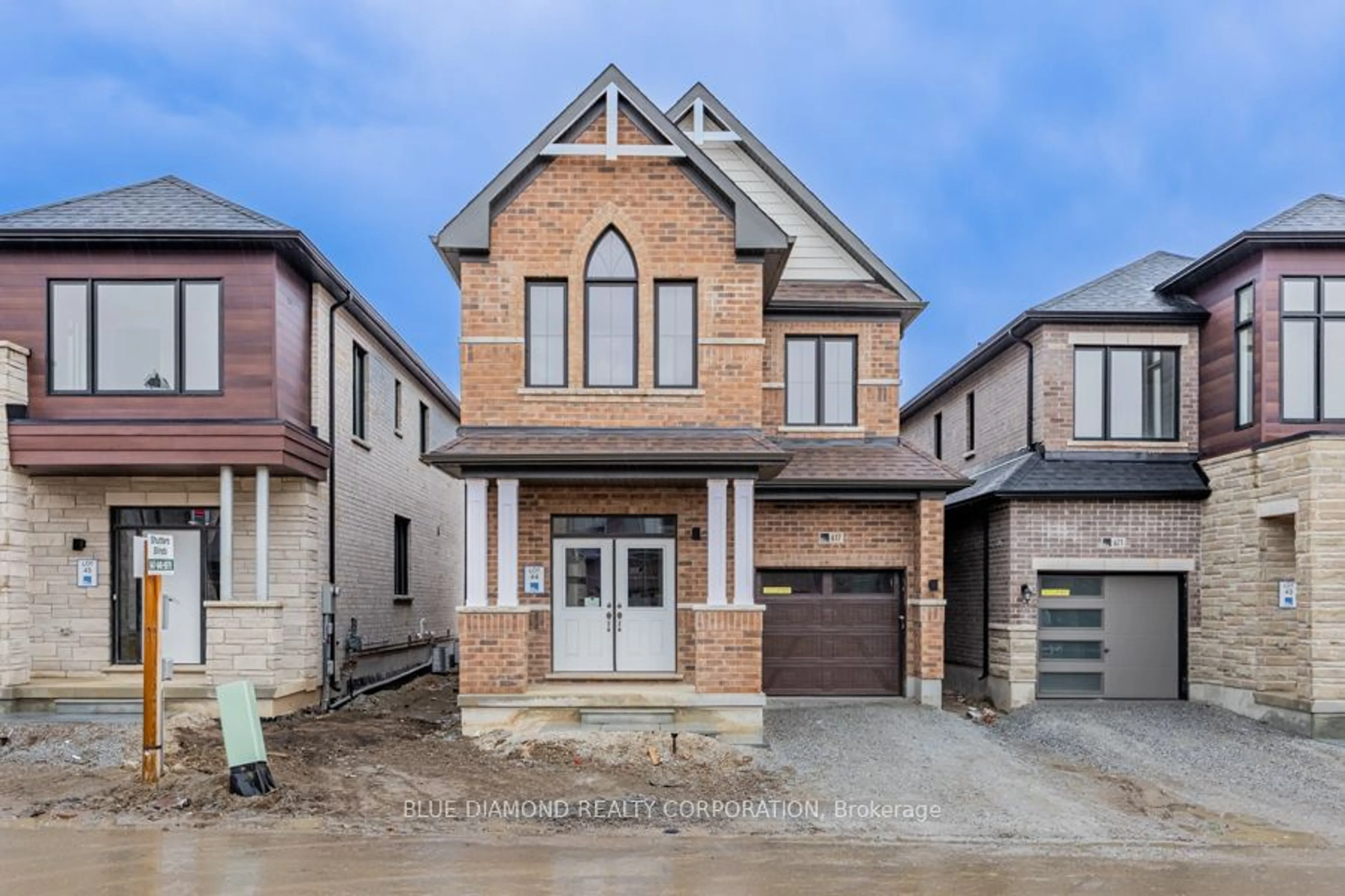 Home with brick exterior material for 617 BEARBERRY Pl, Milton Ontario L9E 1V2