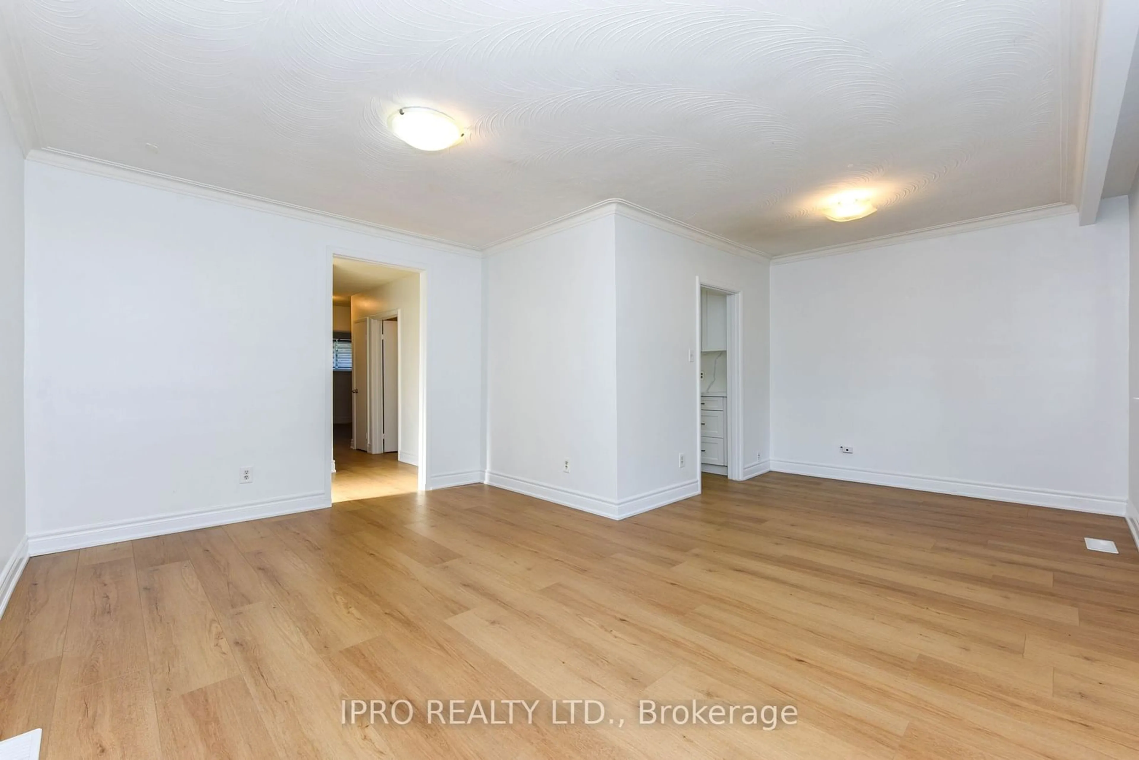 A pic of a room, wood floors for 41 Sherwood Cres, Brampton Ontario L6X 2C9