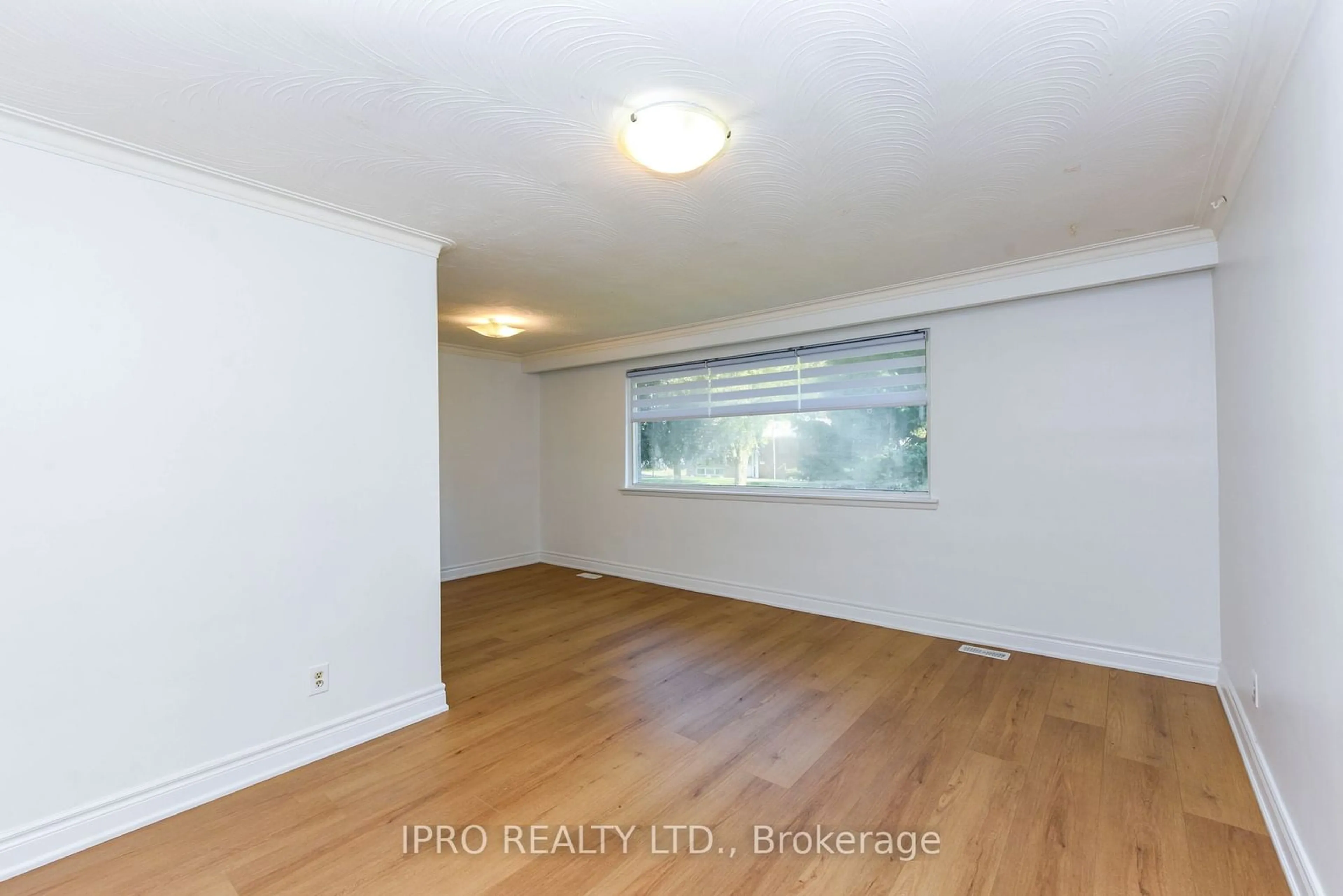 A pic of a room, wood floors for 41 Sherwood Cres, Brampton Ontario L6X 2C9