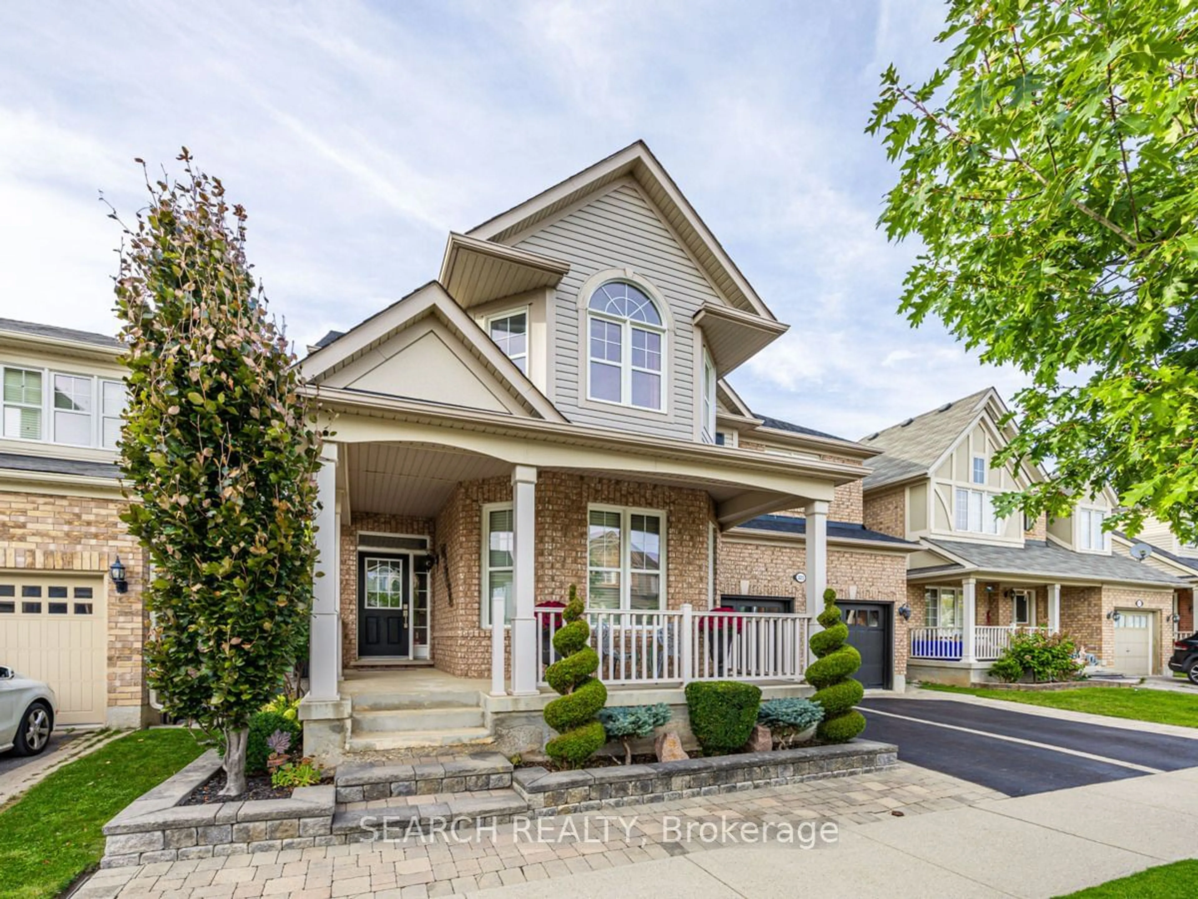 Frontside or backside of a home for 323 McDougall Crossing, Milton Ontario L9T 0N5