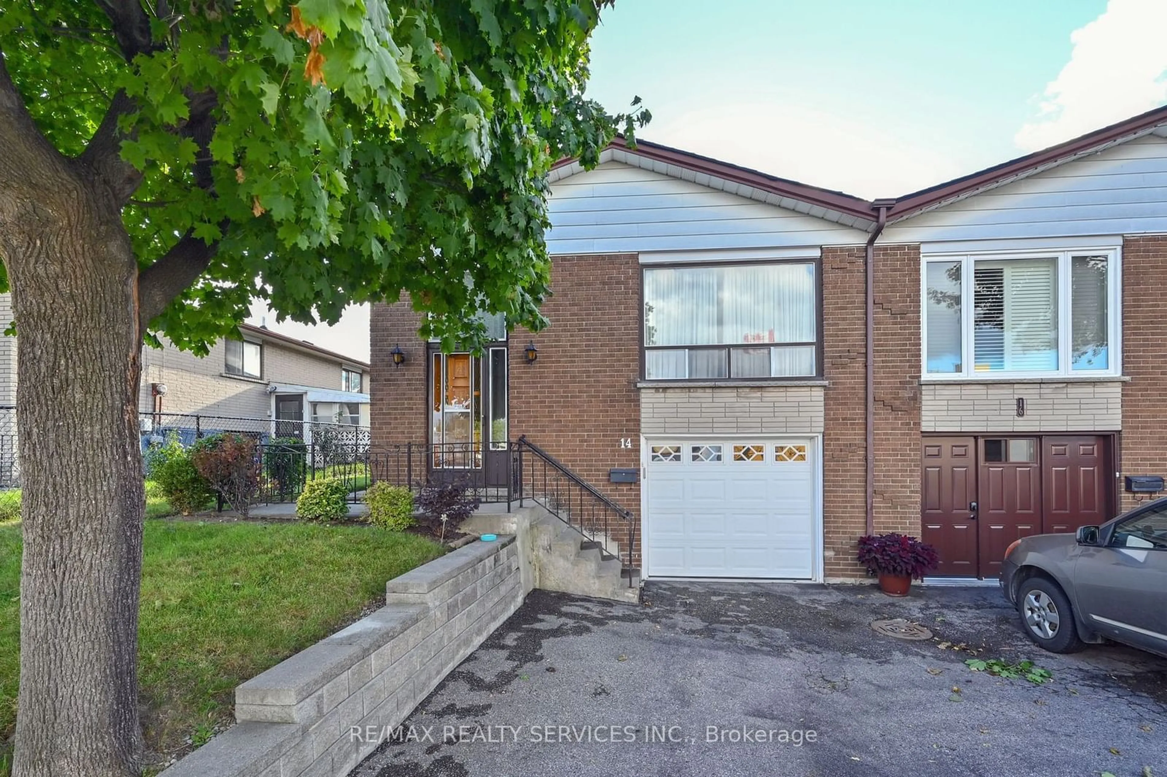 Frontside or backside of a home, the street view for 14 Ardglen Dr, Brampton Ontario L6W 1V2