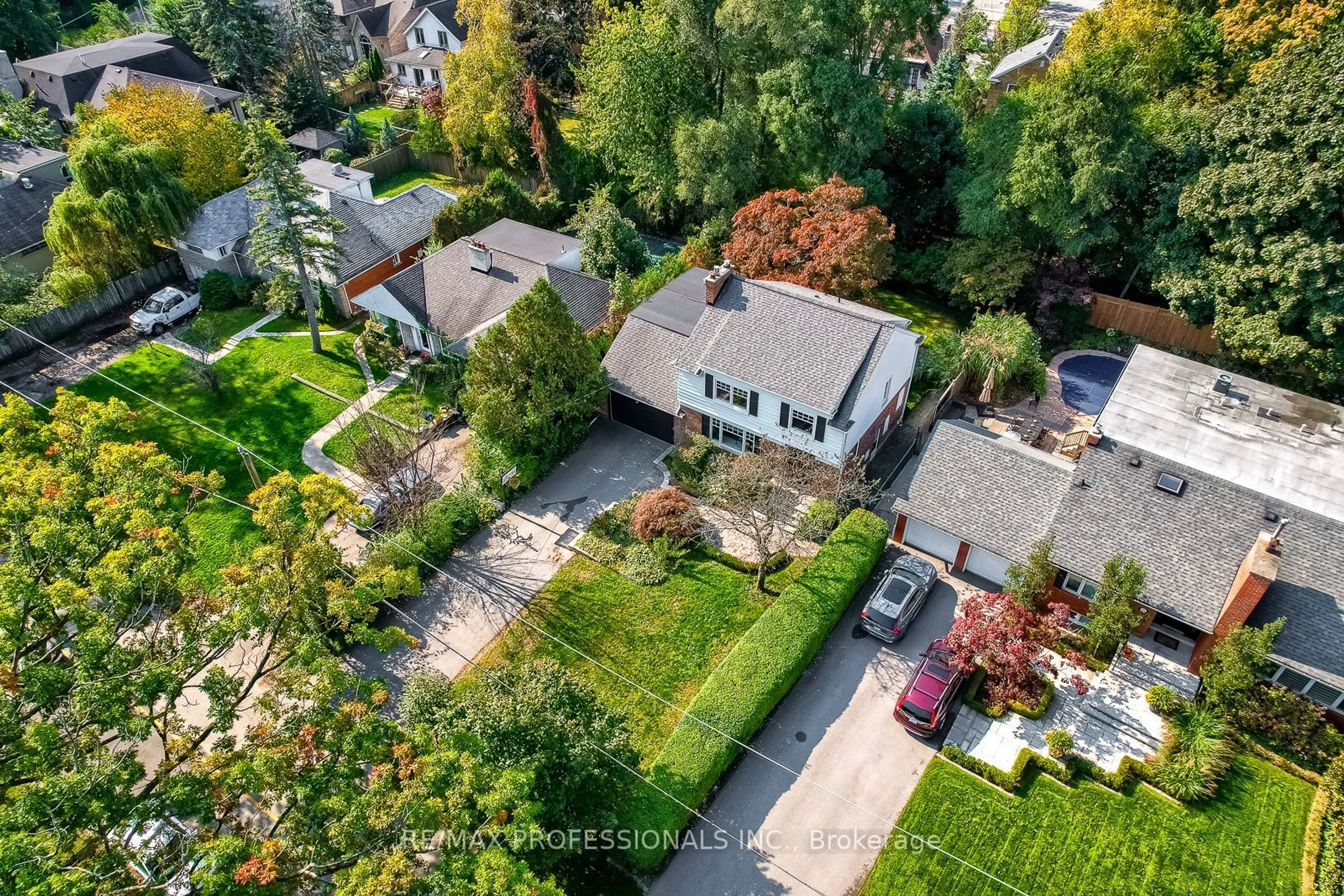 Frontside or backside of a home, the fenced backyard for 8 Edgevalley Dr, Toronto Ontario M9A 4N7