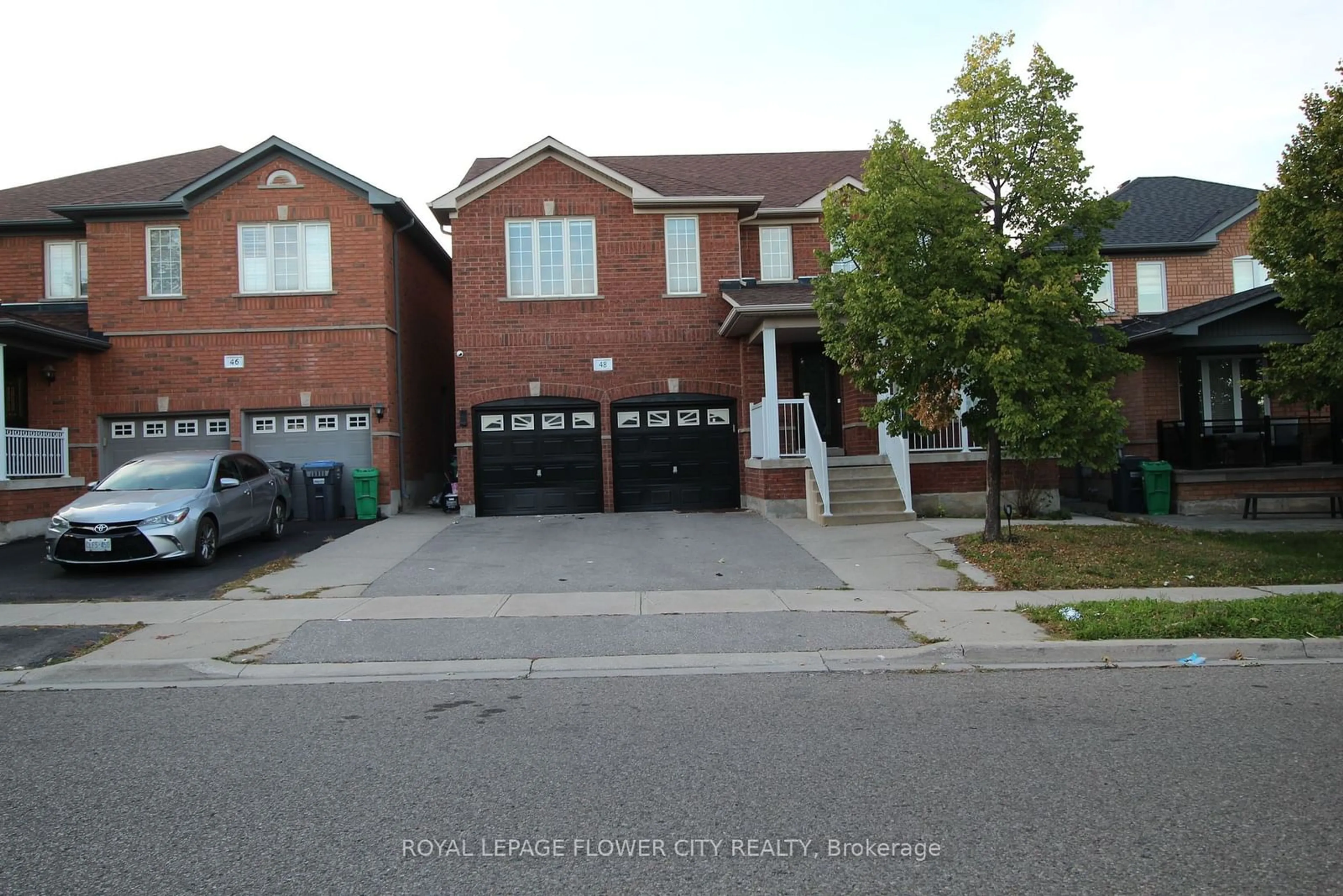 Frontside or backside of a home, the street view for 48 Fairhill Ave, Brampton Ontario L7A 2E7