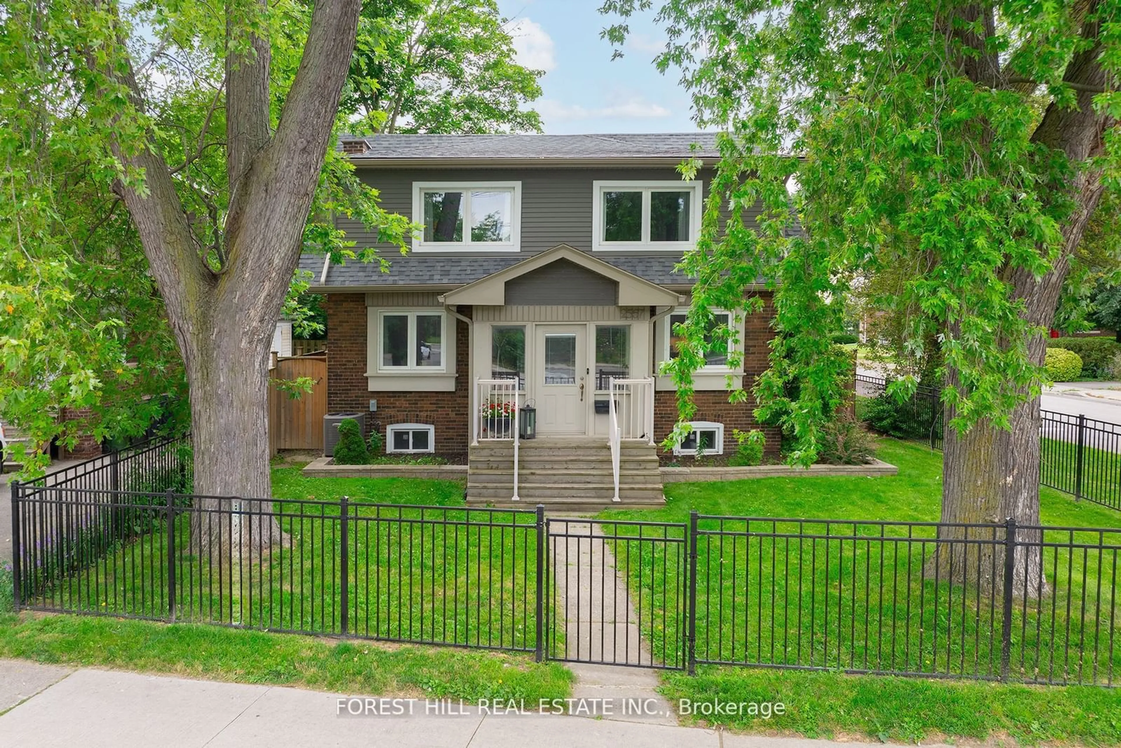 Frontside or backside of a home, the fenced backyard for 2567 Lake Shore Blvd, Toronto Ontario M8V 1E5