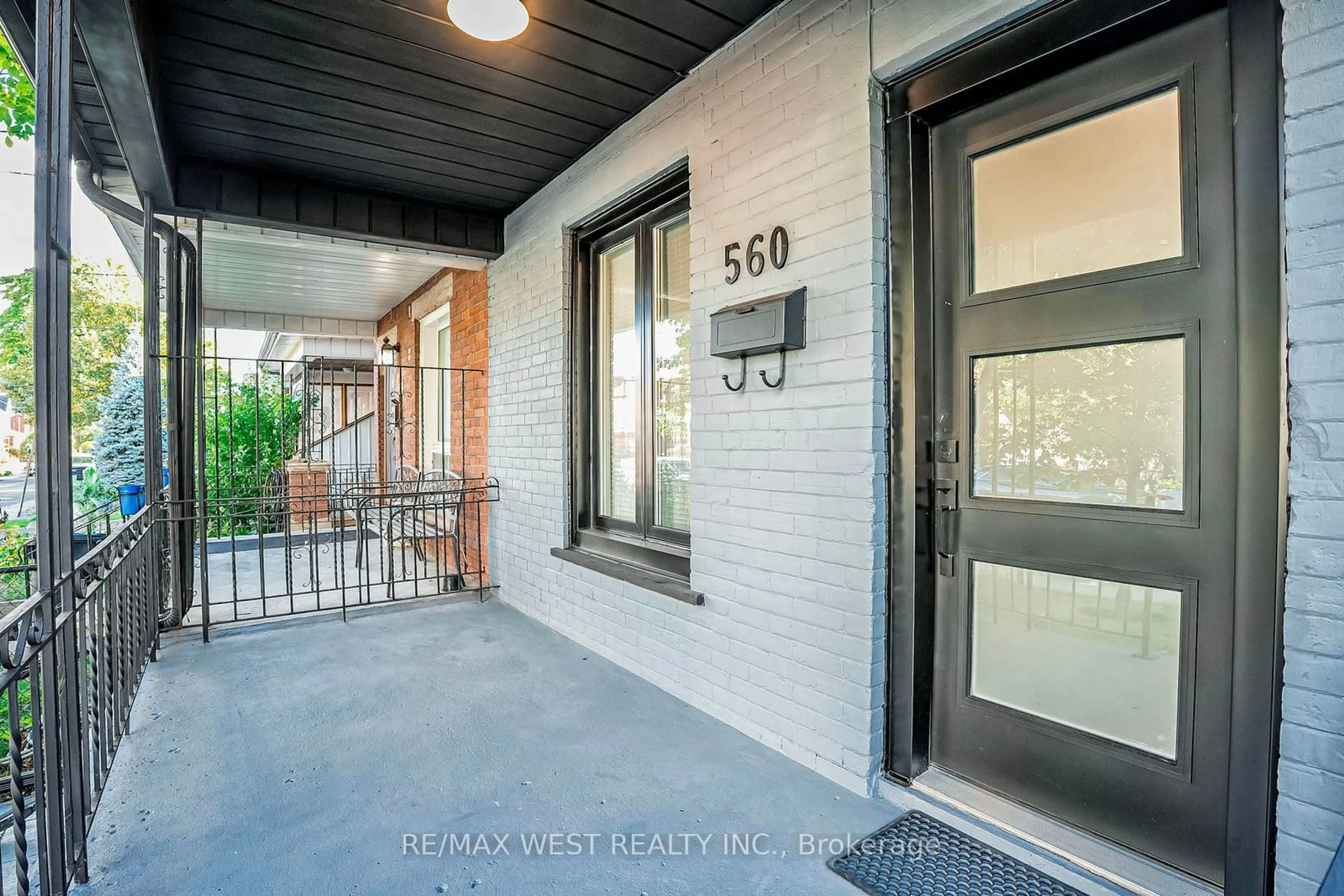 Indoor entryway, wood floors for 560 Perth Ave, Toronto Ontario M6N 2W7