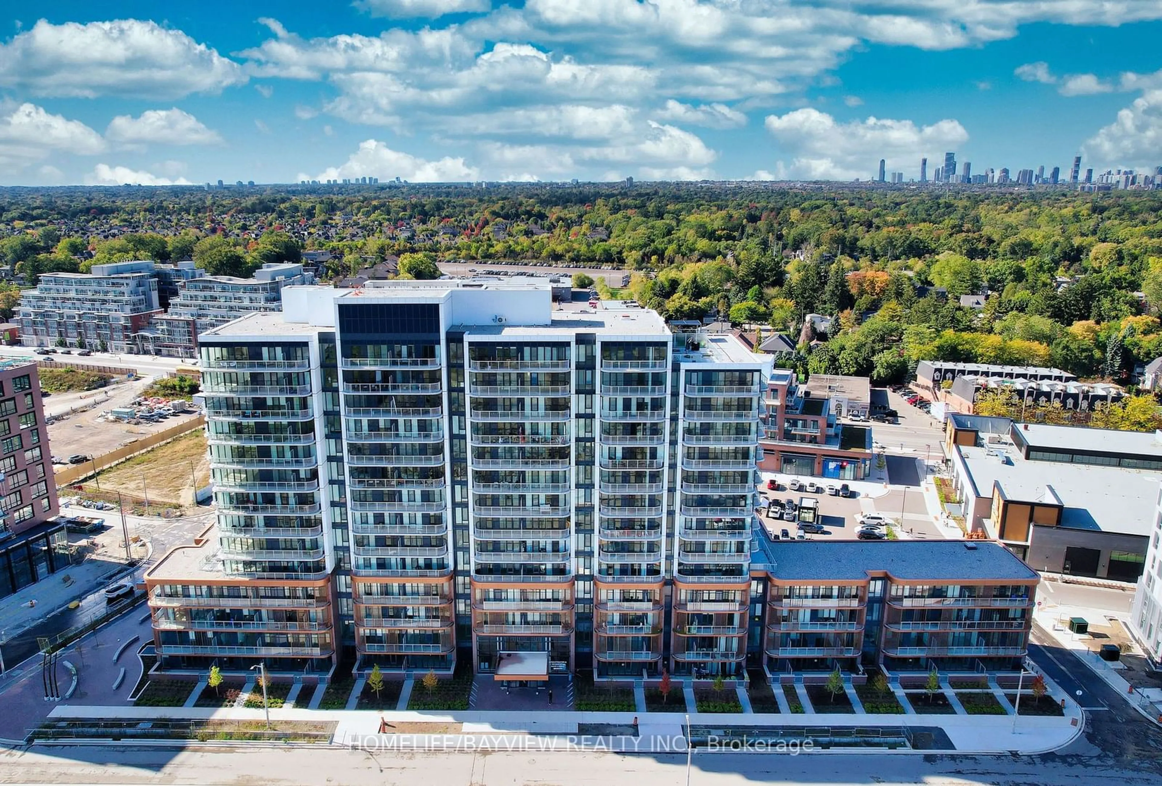 A pic from exterior of the house or condo, the view of city buildings for 220 Missinnihe Way #113, Mississauga Ontario L5H 0A9