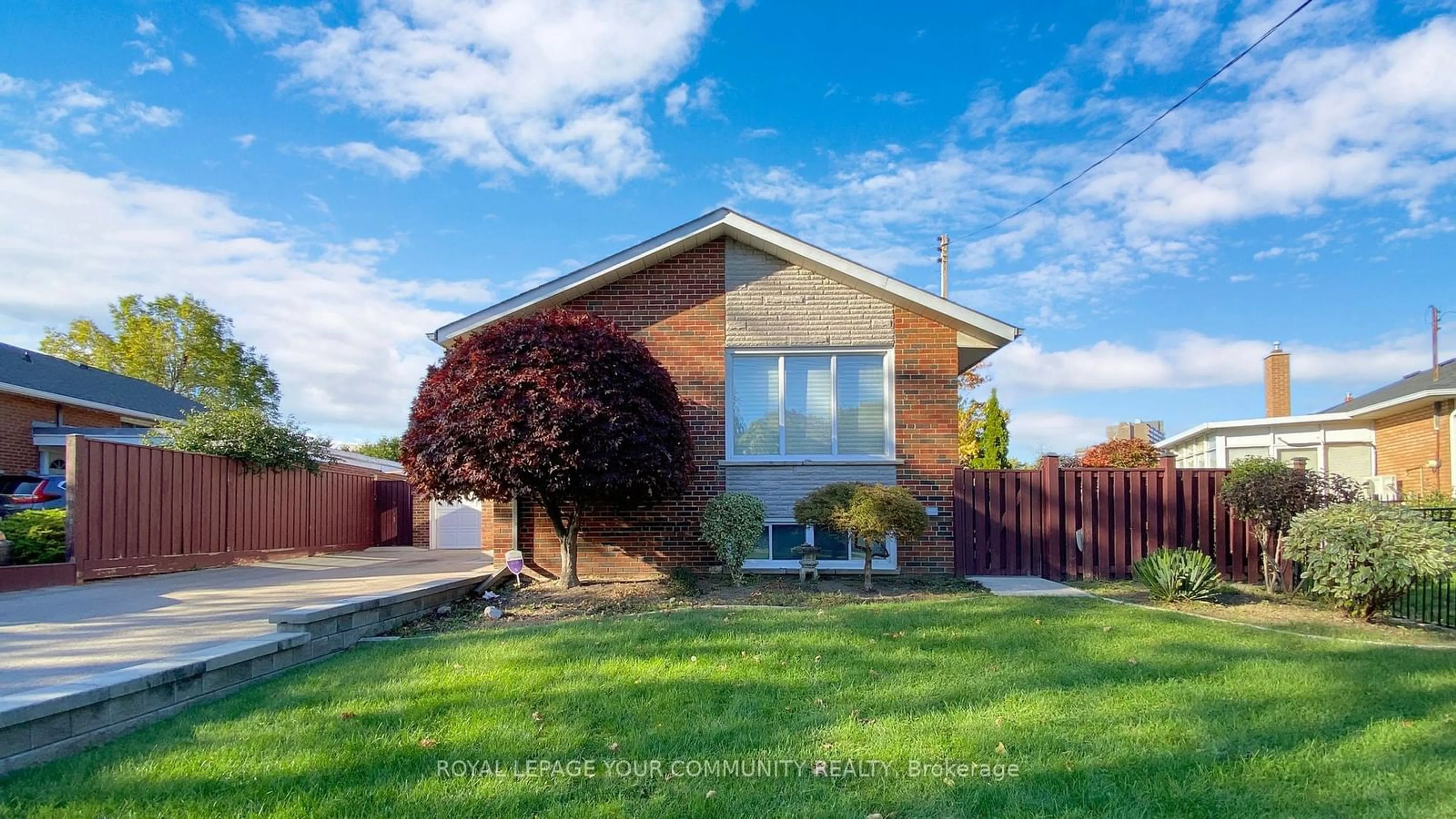 Frontside or backside of a home, the fenced backyard for 44 Nugent Rd, Toronto Ontario M2R 1N3