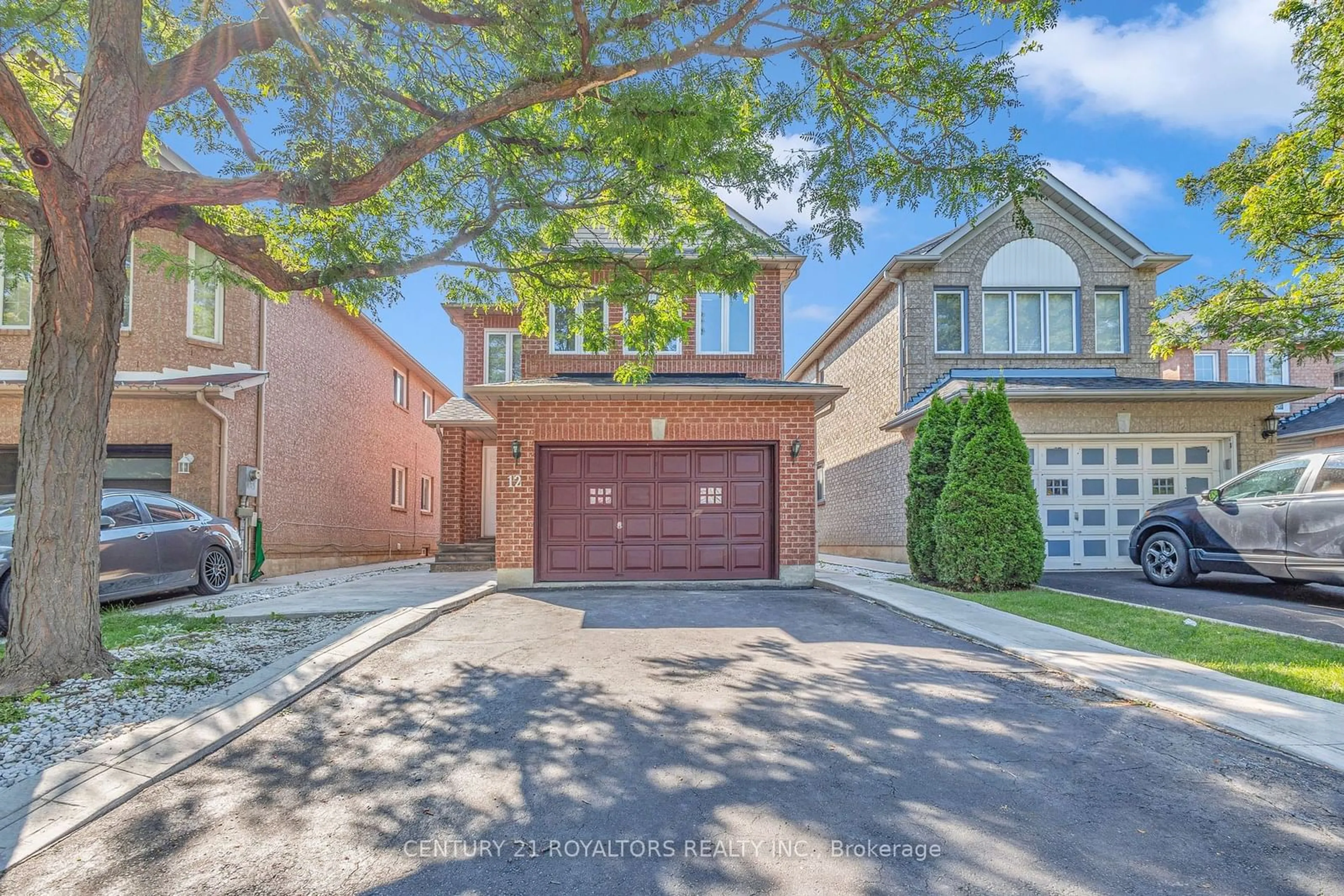 A pic from exterior of the house or condo, the street view for 12 Cedarwood Cres, Brampton Ontario L6X 4K1