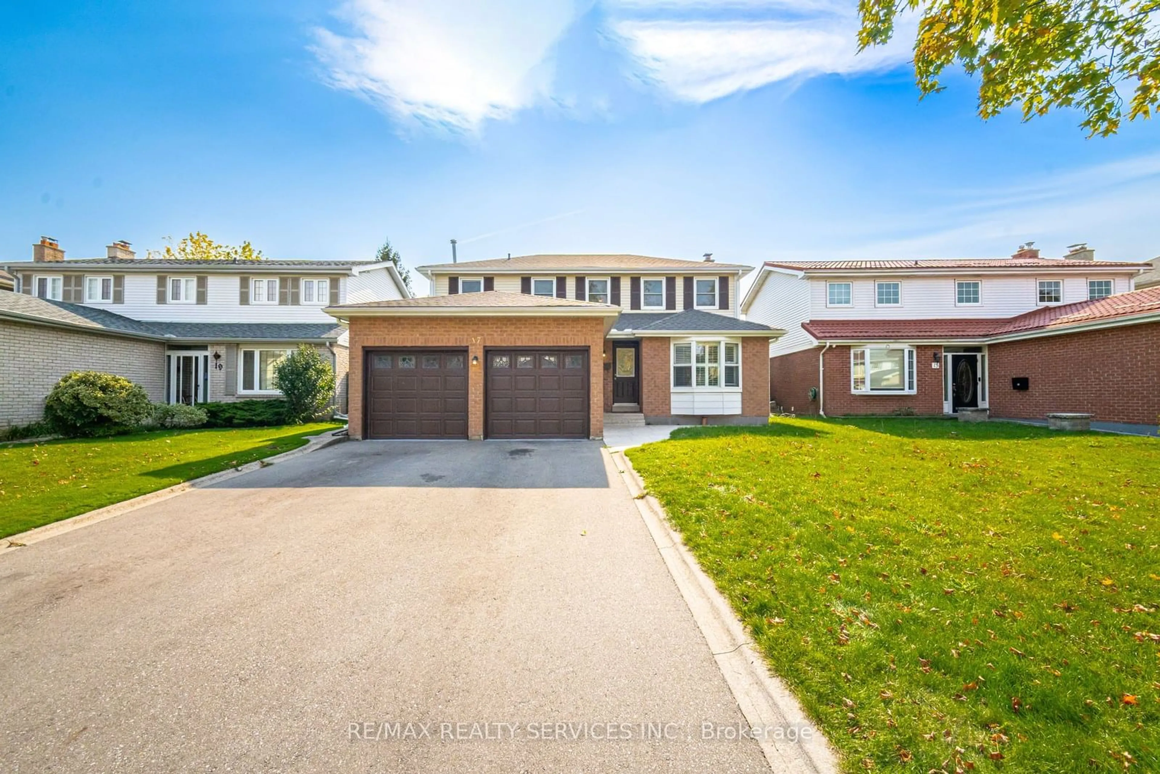 Frontside or backside of a home, the street view for 17 Macdougall Dr, Brampton Ontario L6S 3P4