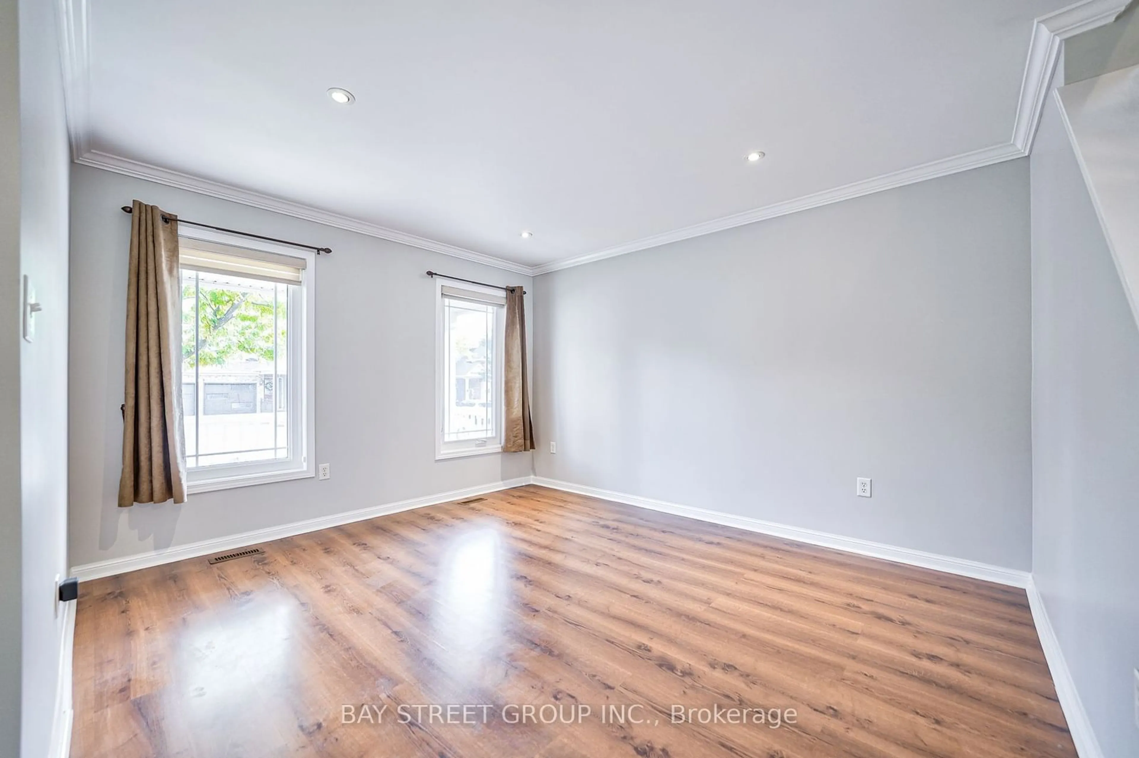 A pic of a room, wood floors for 18 Leagrove St, Brampton Ontario L7A 1Z7