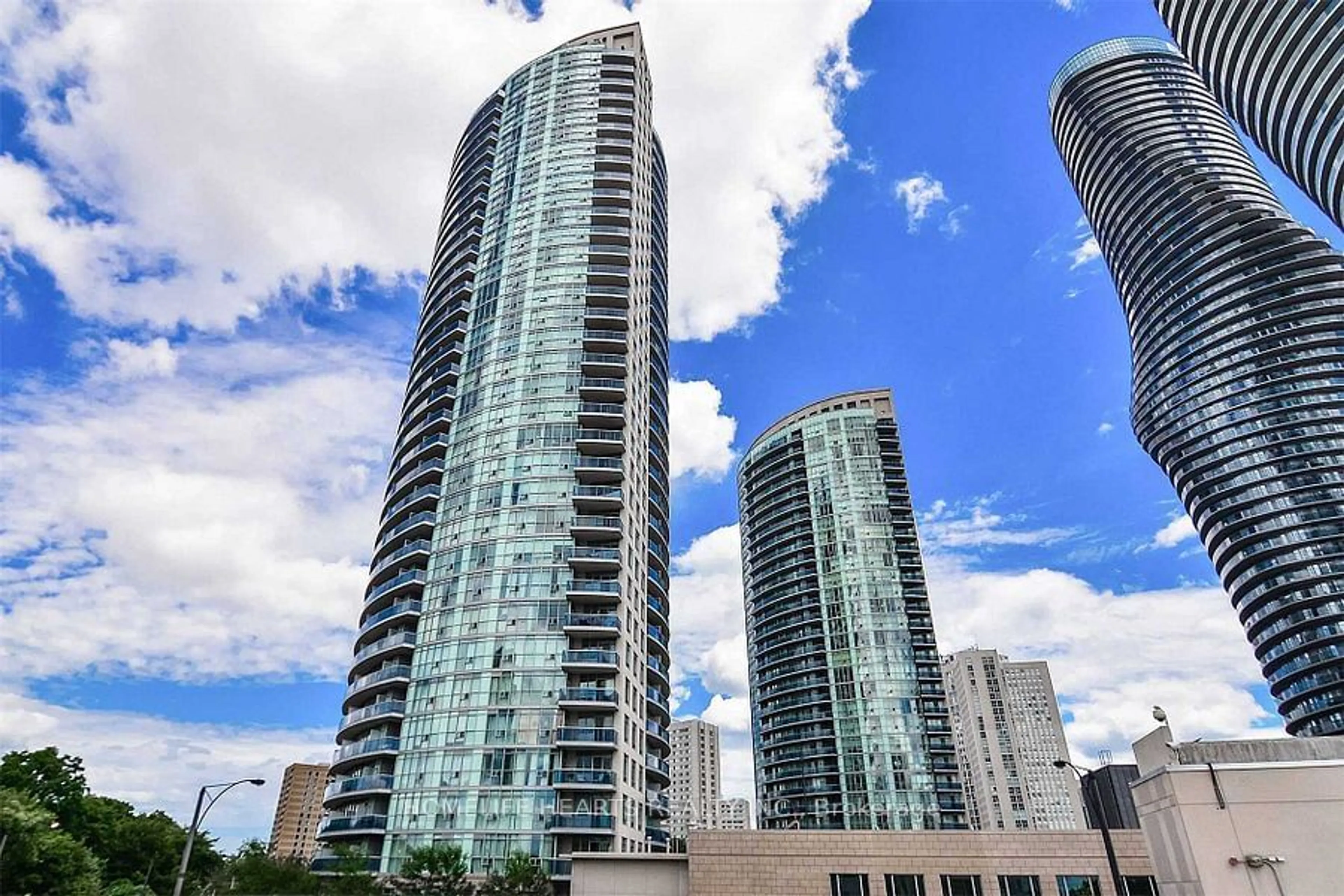 A pic from exterior of the house or condo, the view of city buildings for 80 Absolute Ave #706, Mississauga Ontario L4Z 0A5