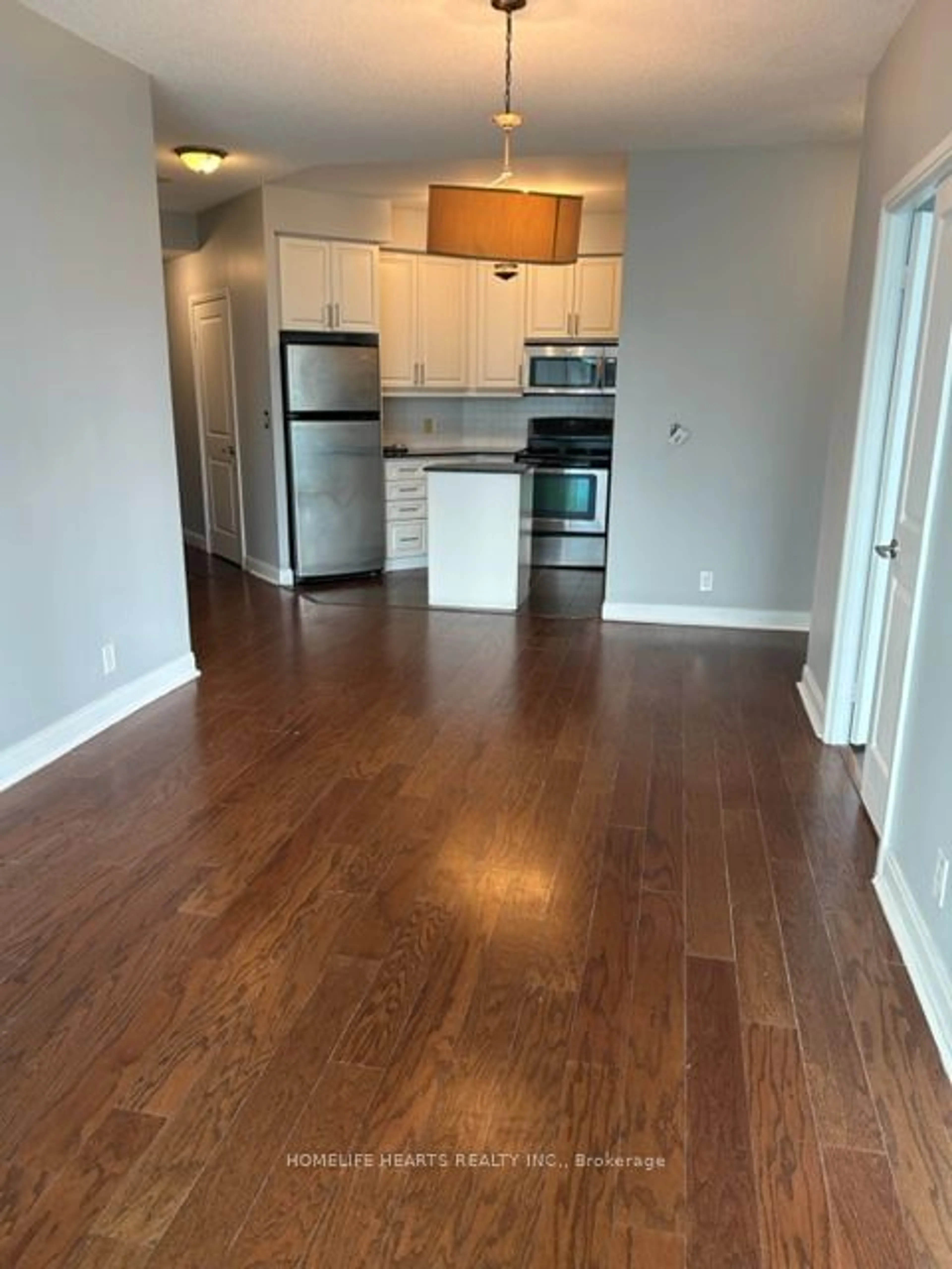 A pic of a room, wood floors for 80 Absolute Ave #706, Mississauga Ontario L4Z 0A5